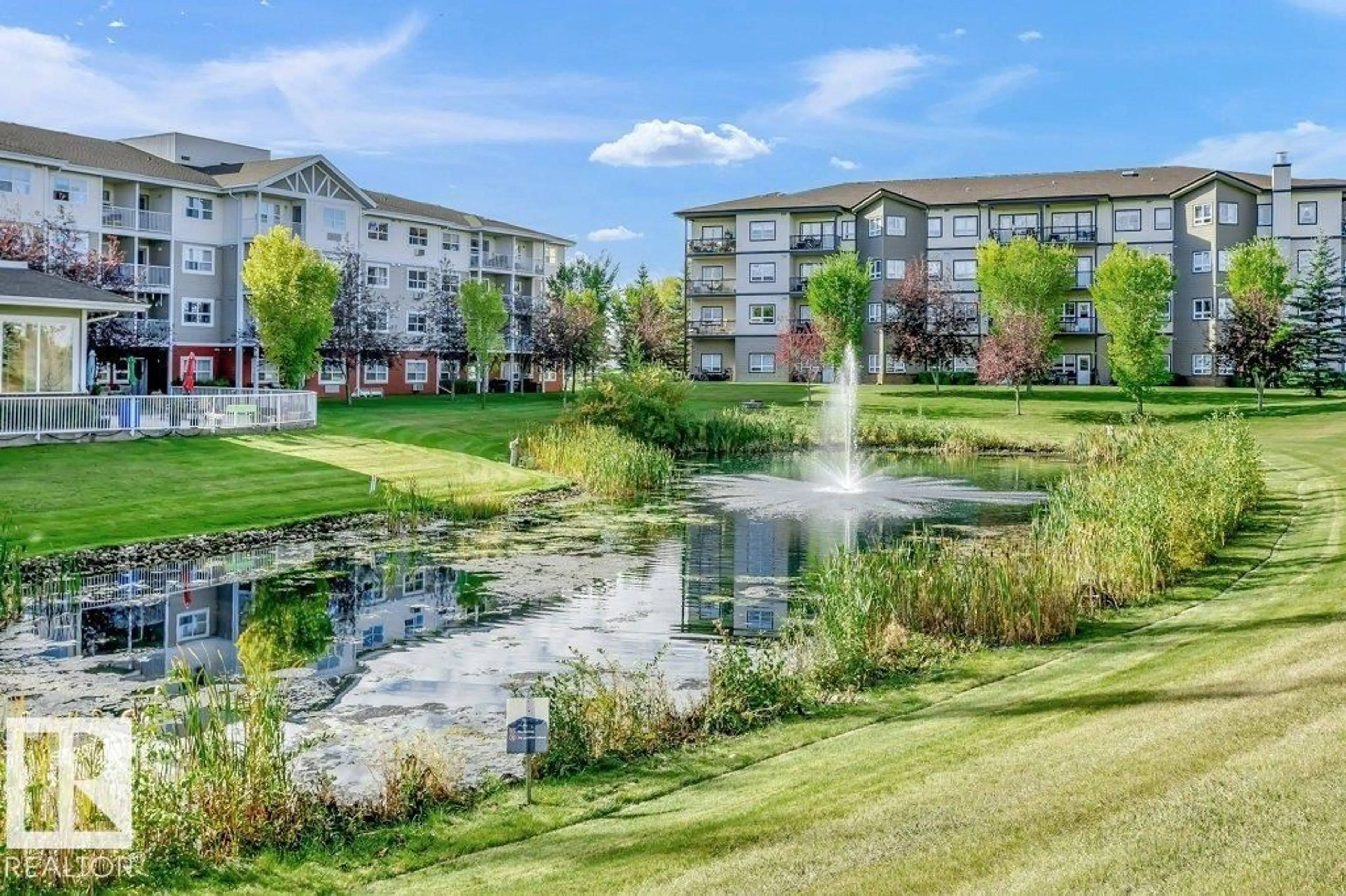 A pic from outside/outdoor area/front of a property/back of a property/a pic from drone, water/lake/river/ocean view for 8802 - 220 SOUTHFORT DR, Fort Saskatchewan Alberta T8L4R6