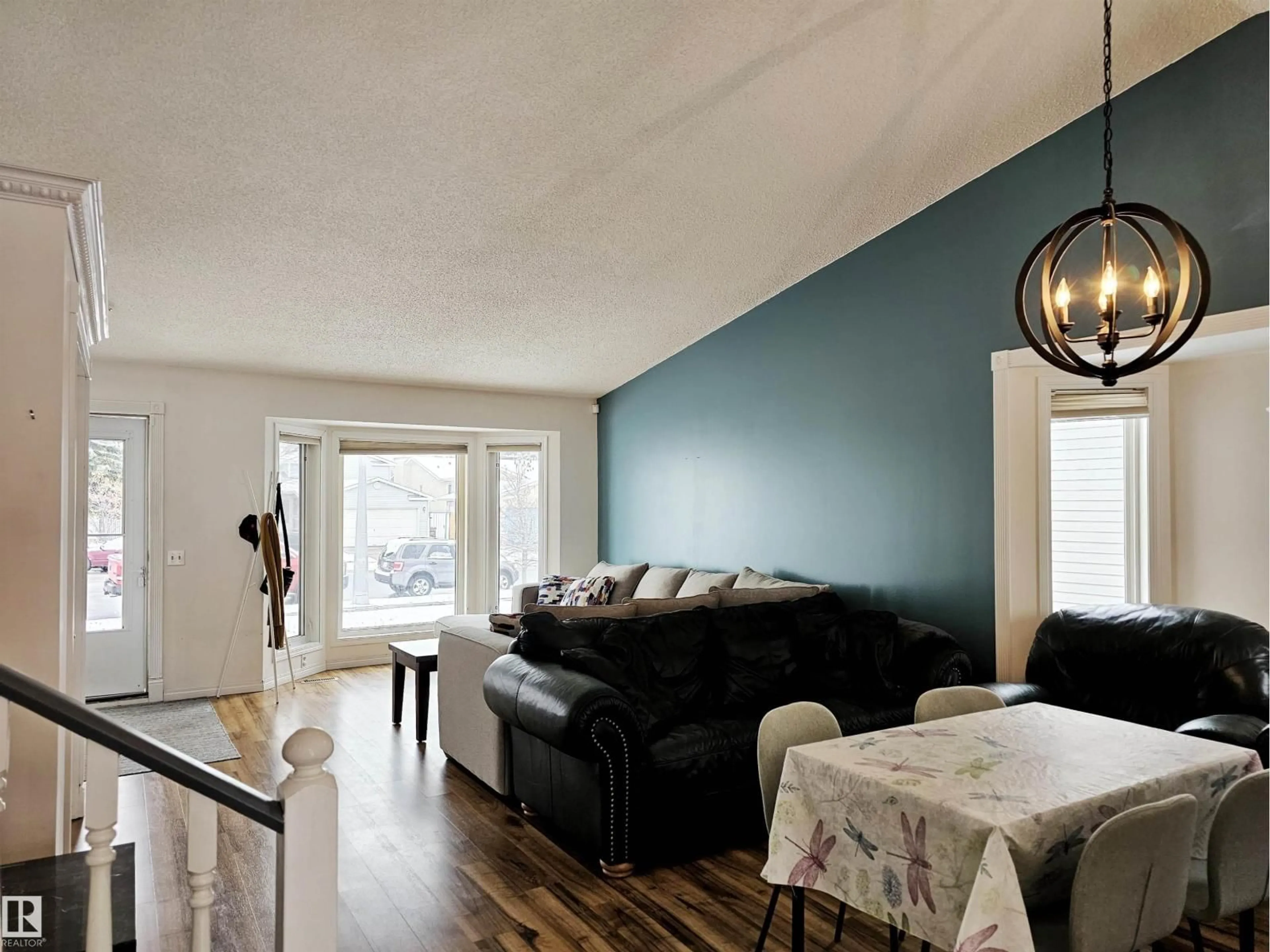 Living room with furniture, wood/laminate floor for 8 DANIEL PL, St. Albert Alberta T8N5P6