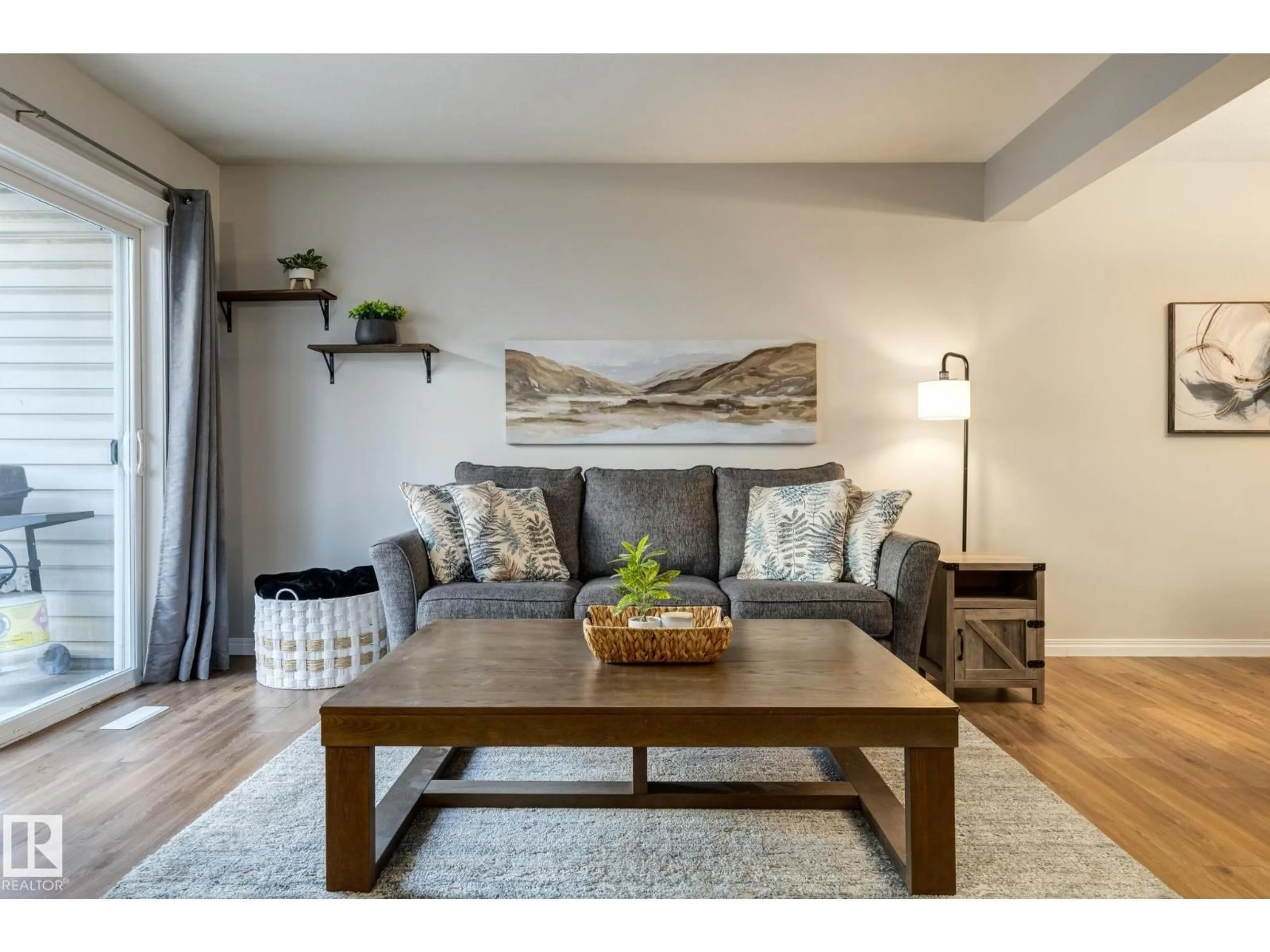 Living room with furniture, wood/laminate floor for 43 - 2505 42 ST, Edmonton Alberta T6L7G8