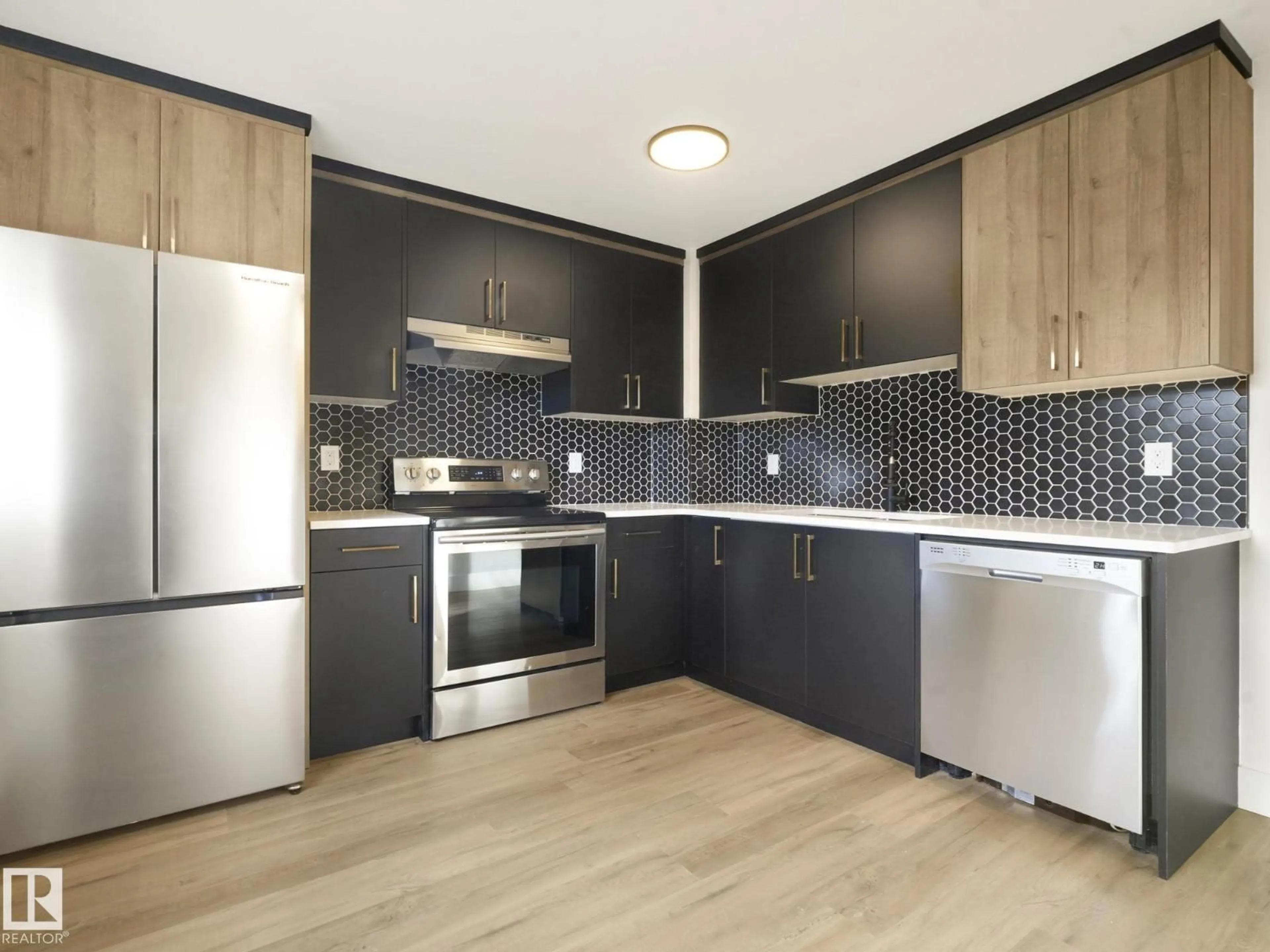 Standard kitchen, wood/laminate floor for 13833 30 ST NW, Edmonton Alberta T5Y2B2