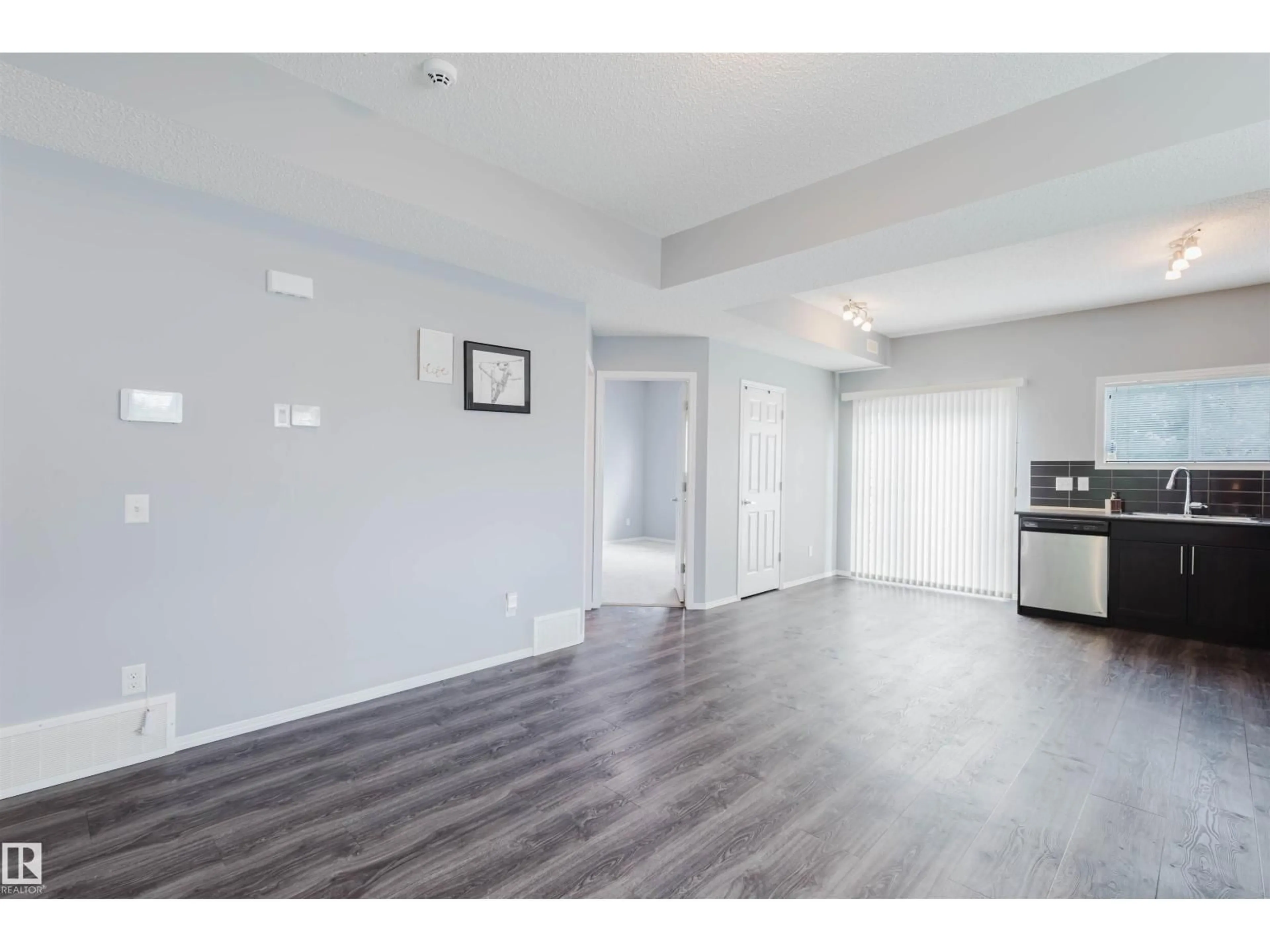 A pic of a room for 9 - 6520 2 AV SW, Edmonton Alberta T6X1S4