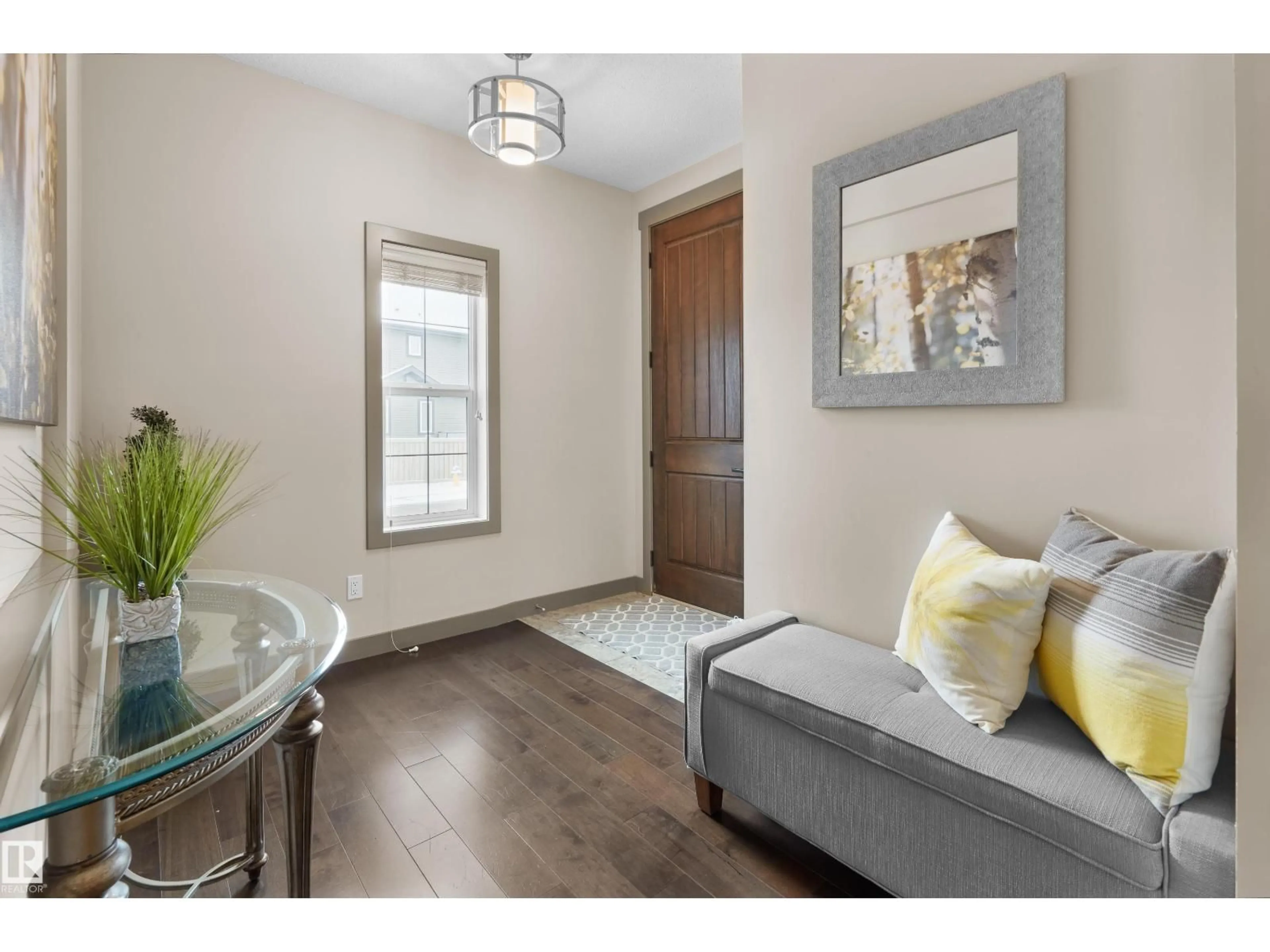 Living room with furniture, wood/laminate floor for 5703 EDWORTHY LANDING LD, Edmonton Alberta T6M0P2