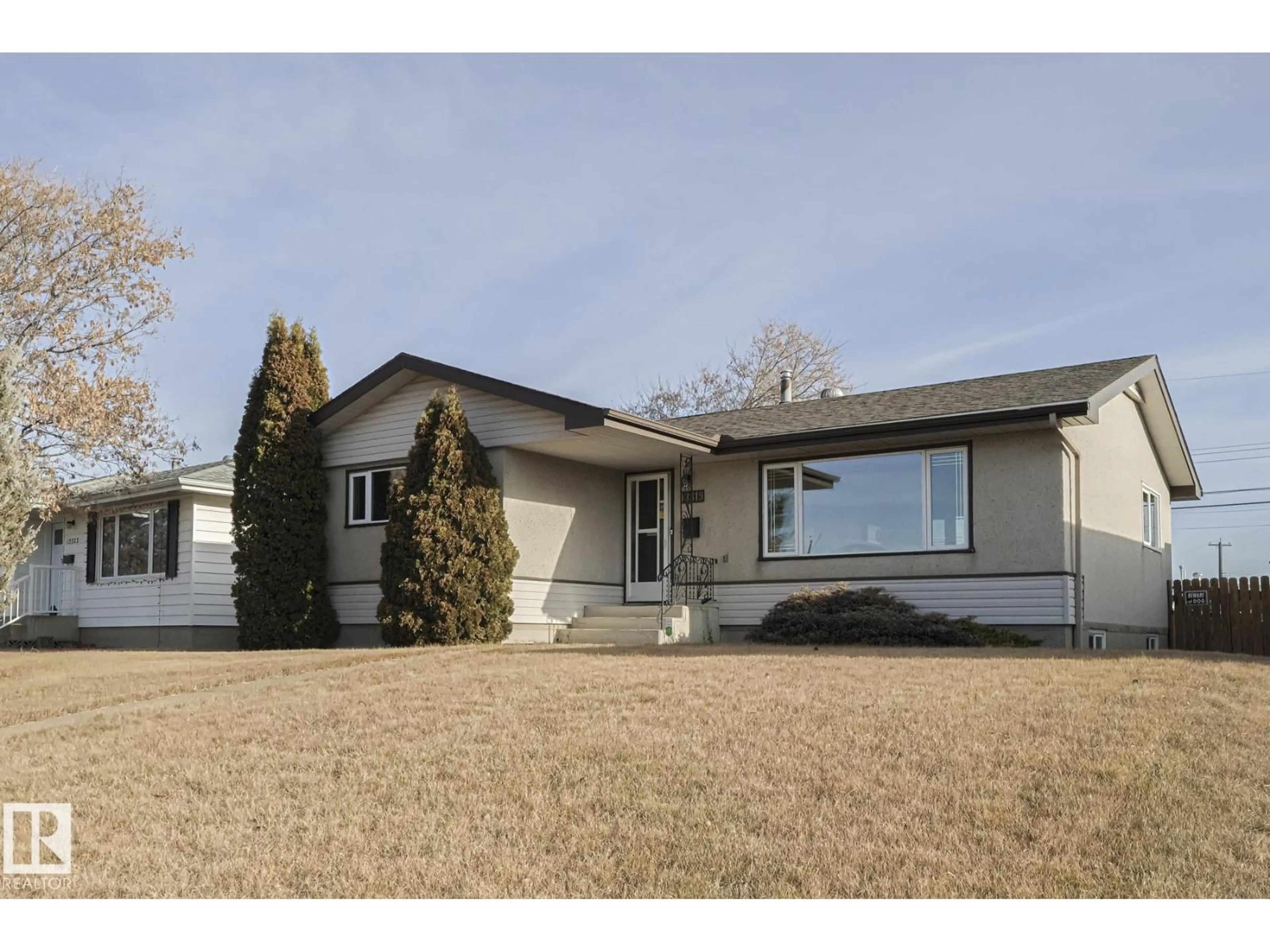 Home with vinyl exterior material, street for 13319 DELWOOD RD, Edmonton Alberta T5C3B5