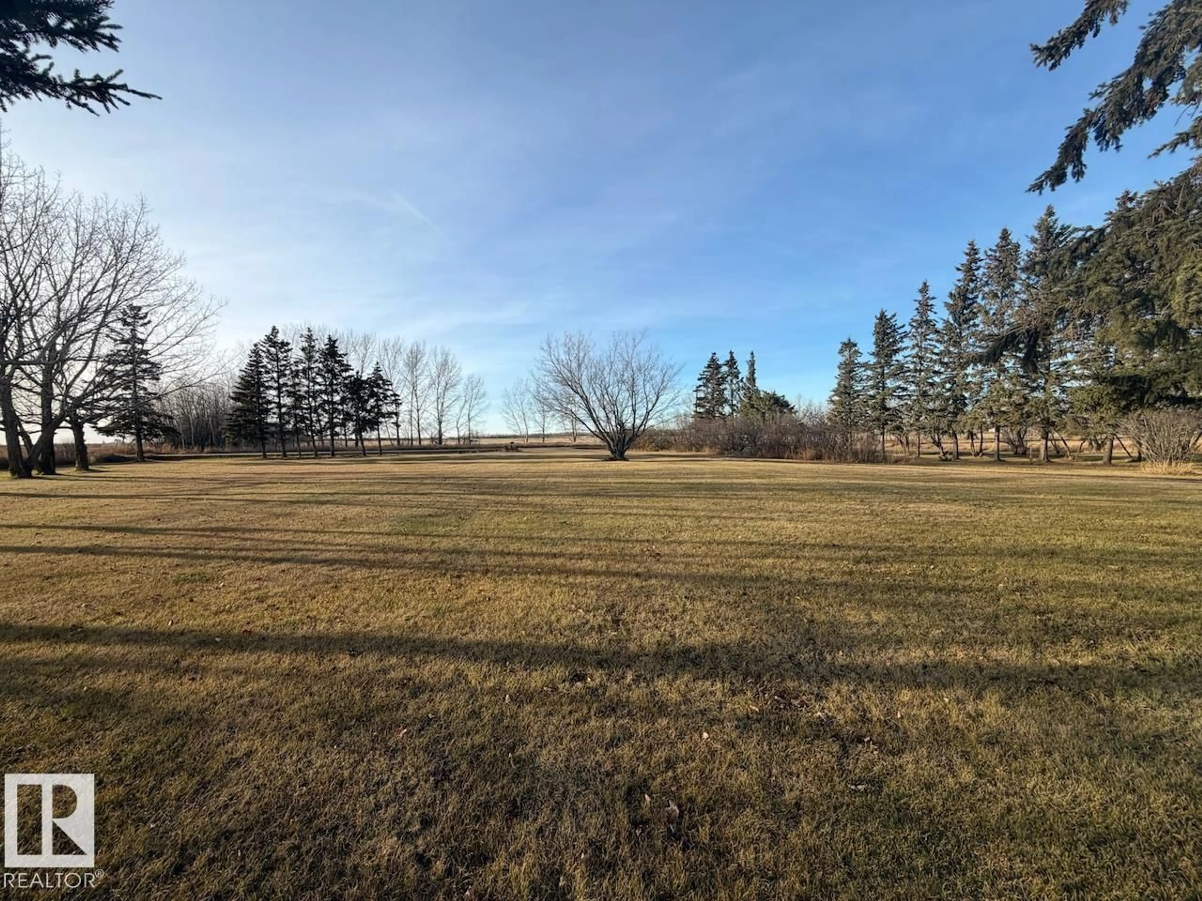 A pic from outside/outdoor area/front of a property/back of a property/a pic from drone, forest/trees view for 61017 RGE ROAD 261, Rural Westlock County Alberta T7P2N9