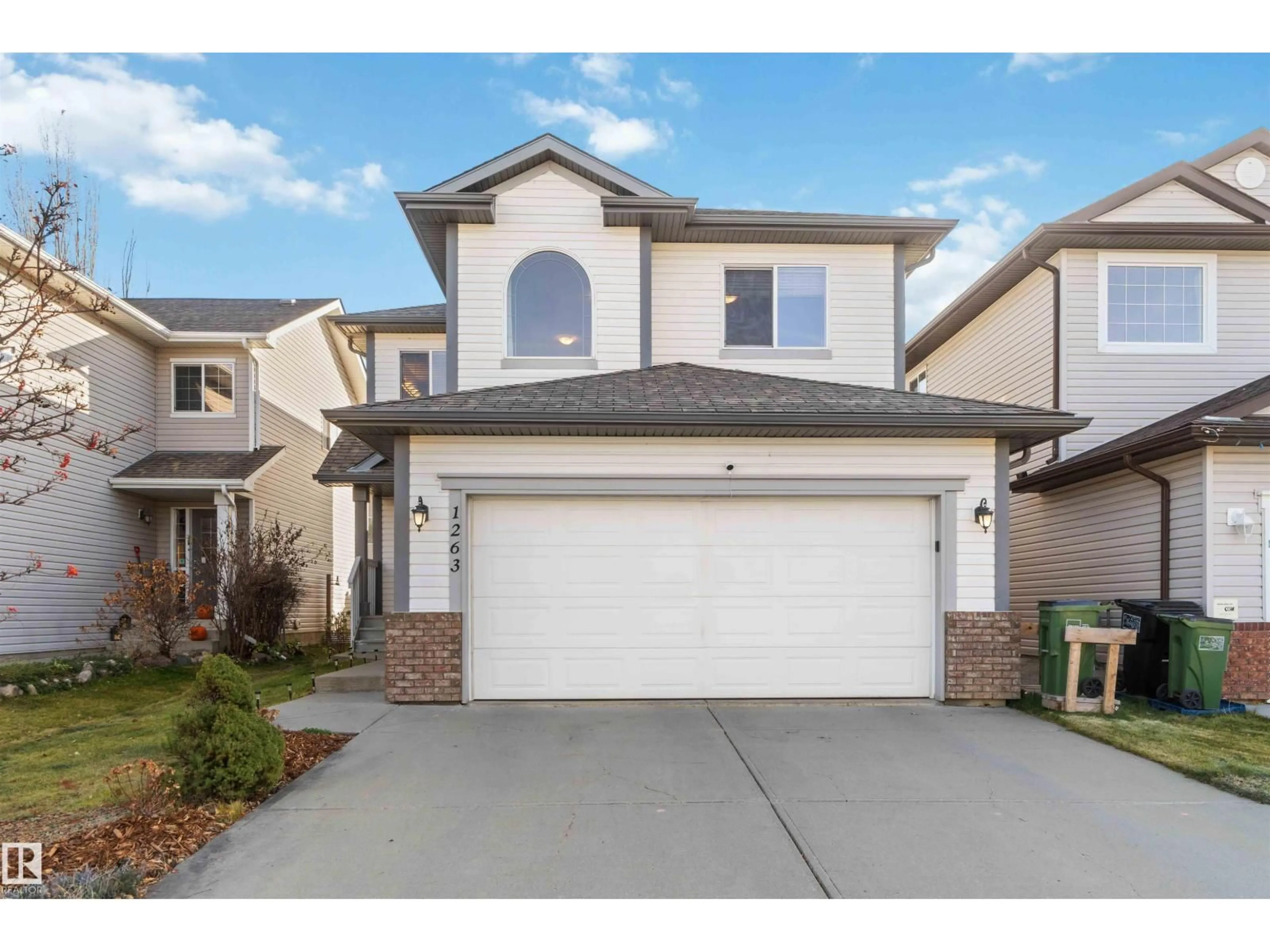 Home with vinyl exterior material, street for 1263 MCALLISTER WY, Edmonton Alberta T6W0B1