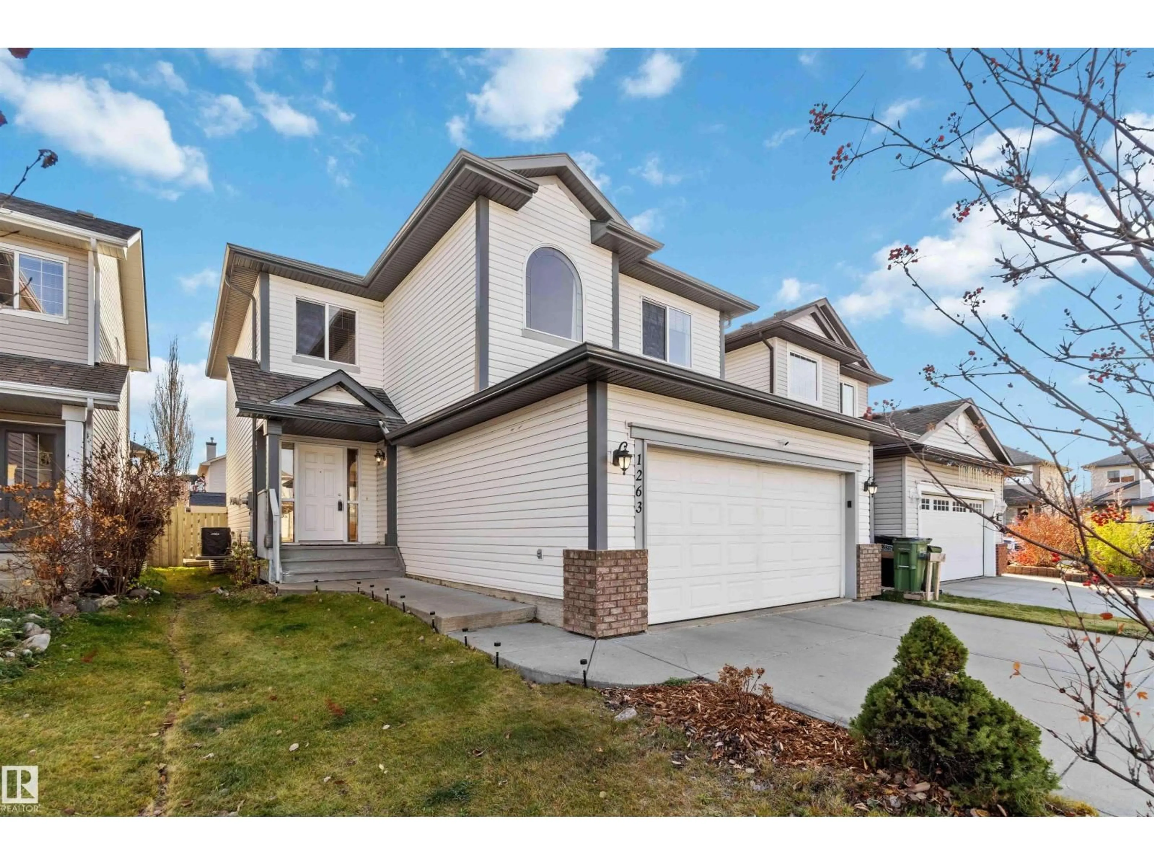 Home with vinyl exterior material, street for 1263 MCALLISTER WY, Edmonton Alberta T6W0B1