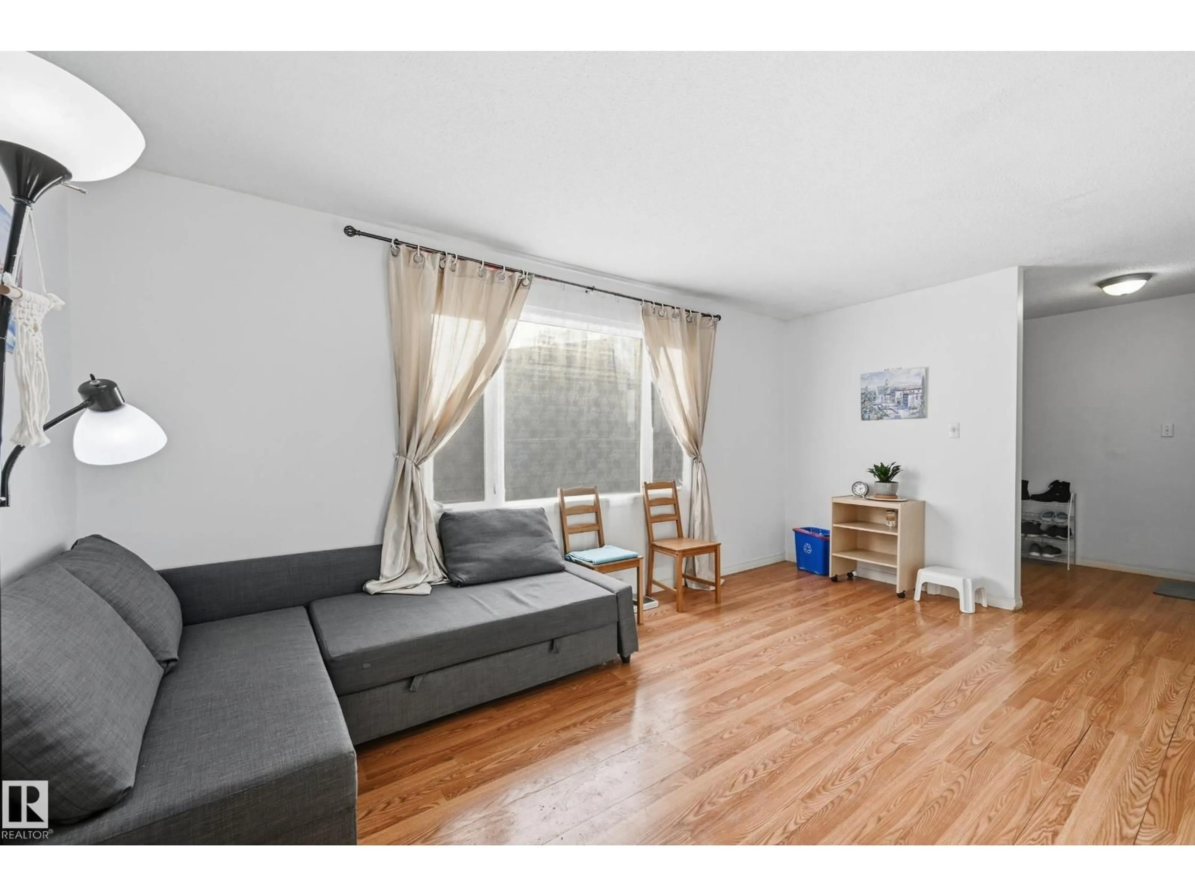 Living room with furniture, wood/laminate floor for #4 - 14310 80 ST, Edmonton Alberta T5C1L6