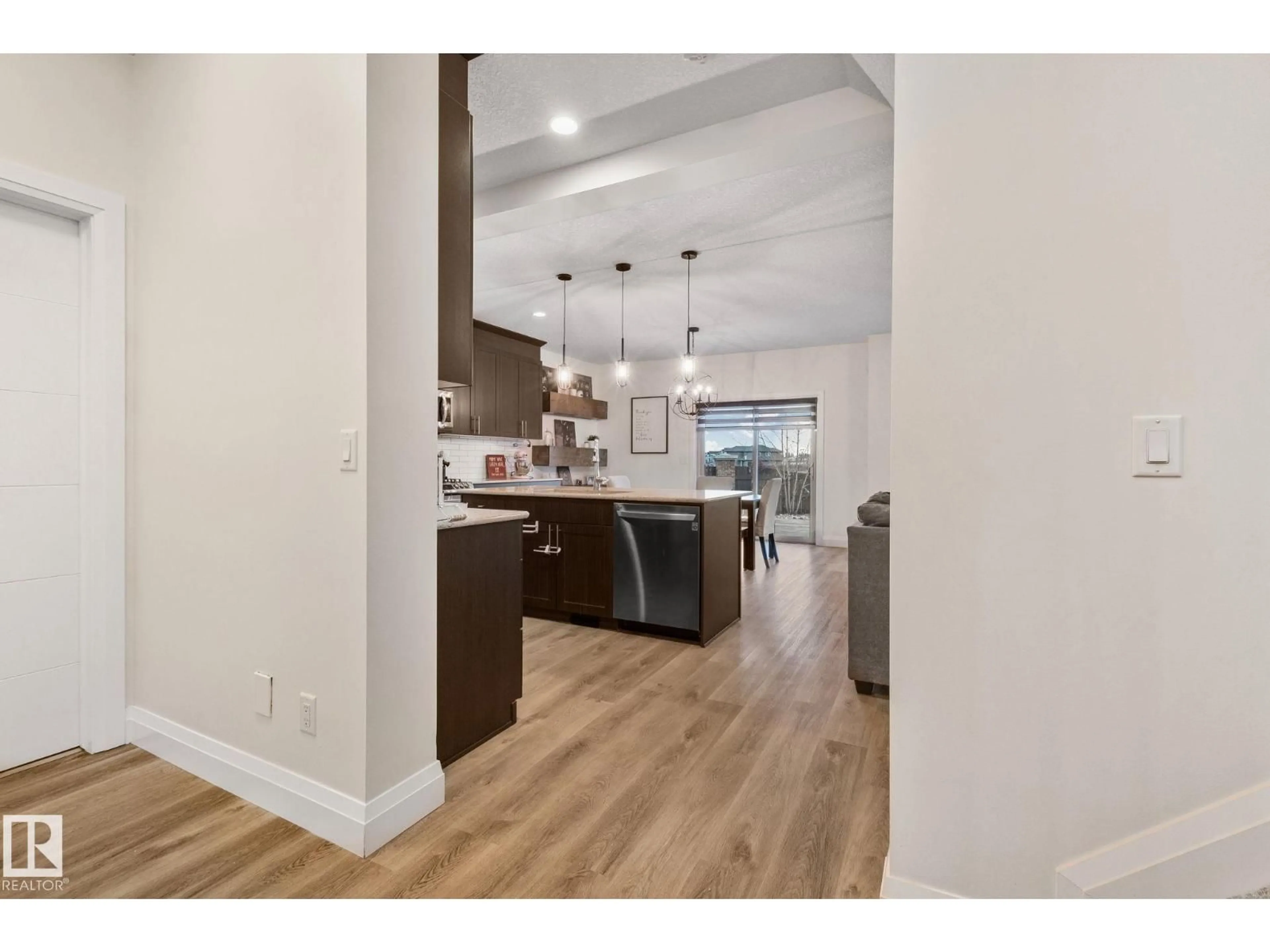 Open concept kitchen, wood/laminate floor for 52 GREENBURY CL, Spruce Grove Alberta T7X0L7