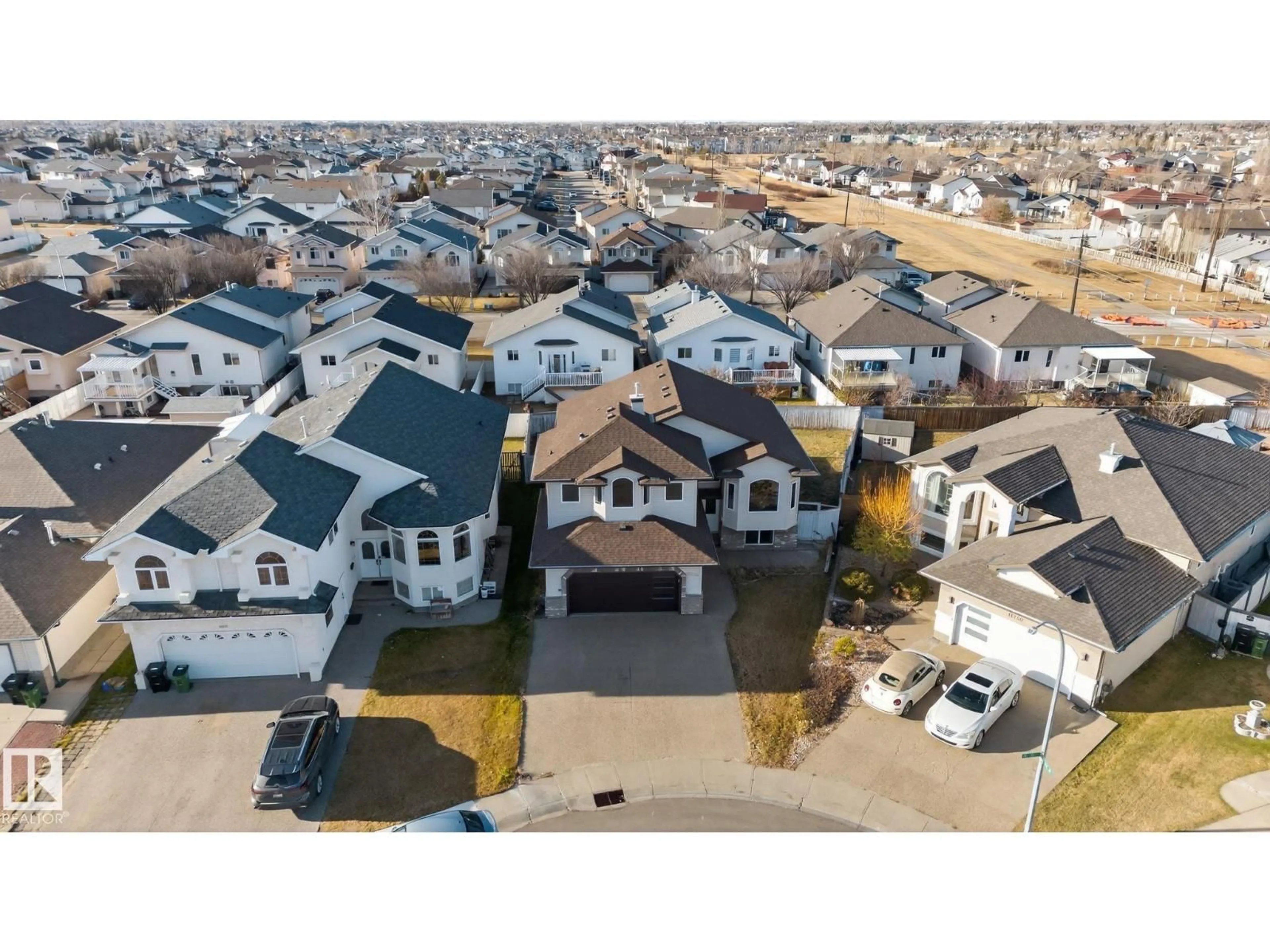 A pic from outside/outdoor area/front of a property/back of a property/a pic from drone, street for 16136 76 ST, Edmonton Alberta T5Z3R8