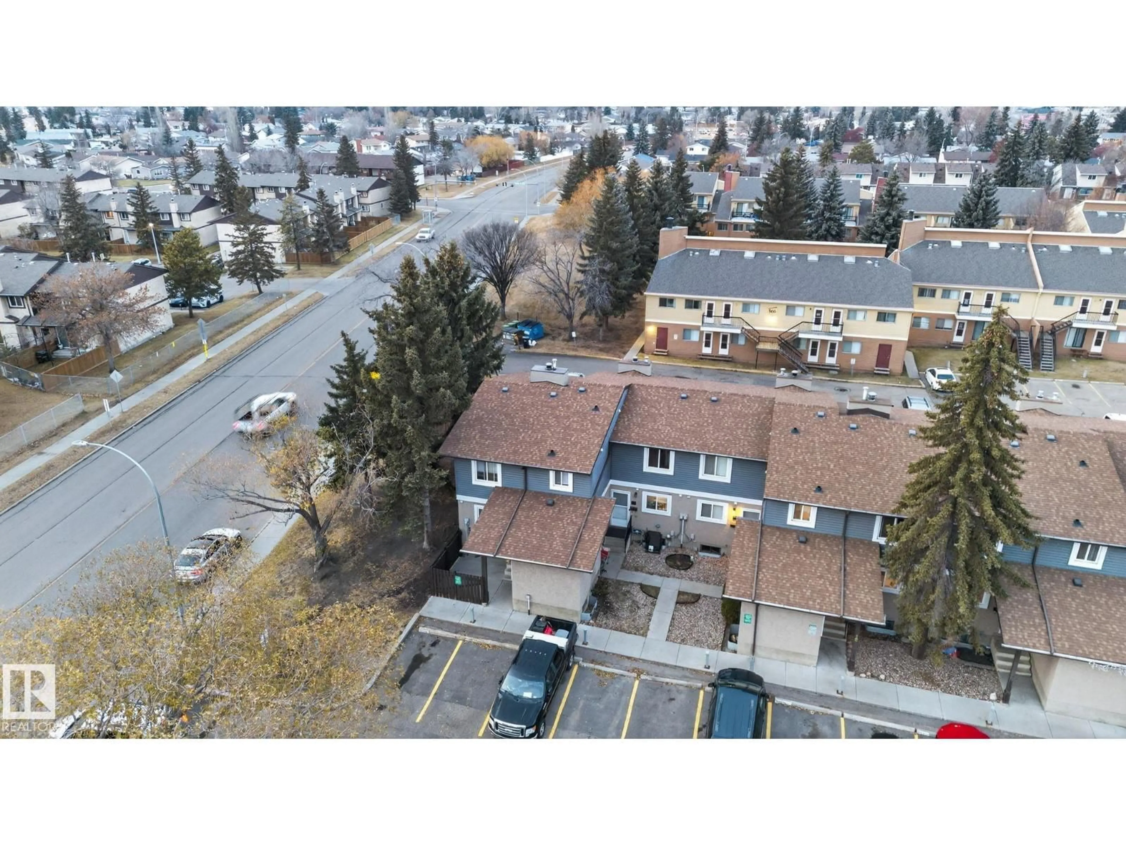 A pic from outside/outdoor area/front of a property/back of a property/a pic from drone, street for 77 - 7604 29 AV, Edmonton Alberta T6K3Z2