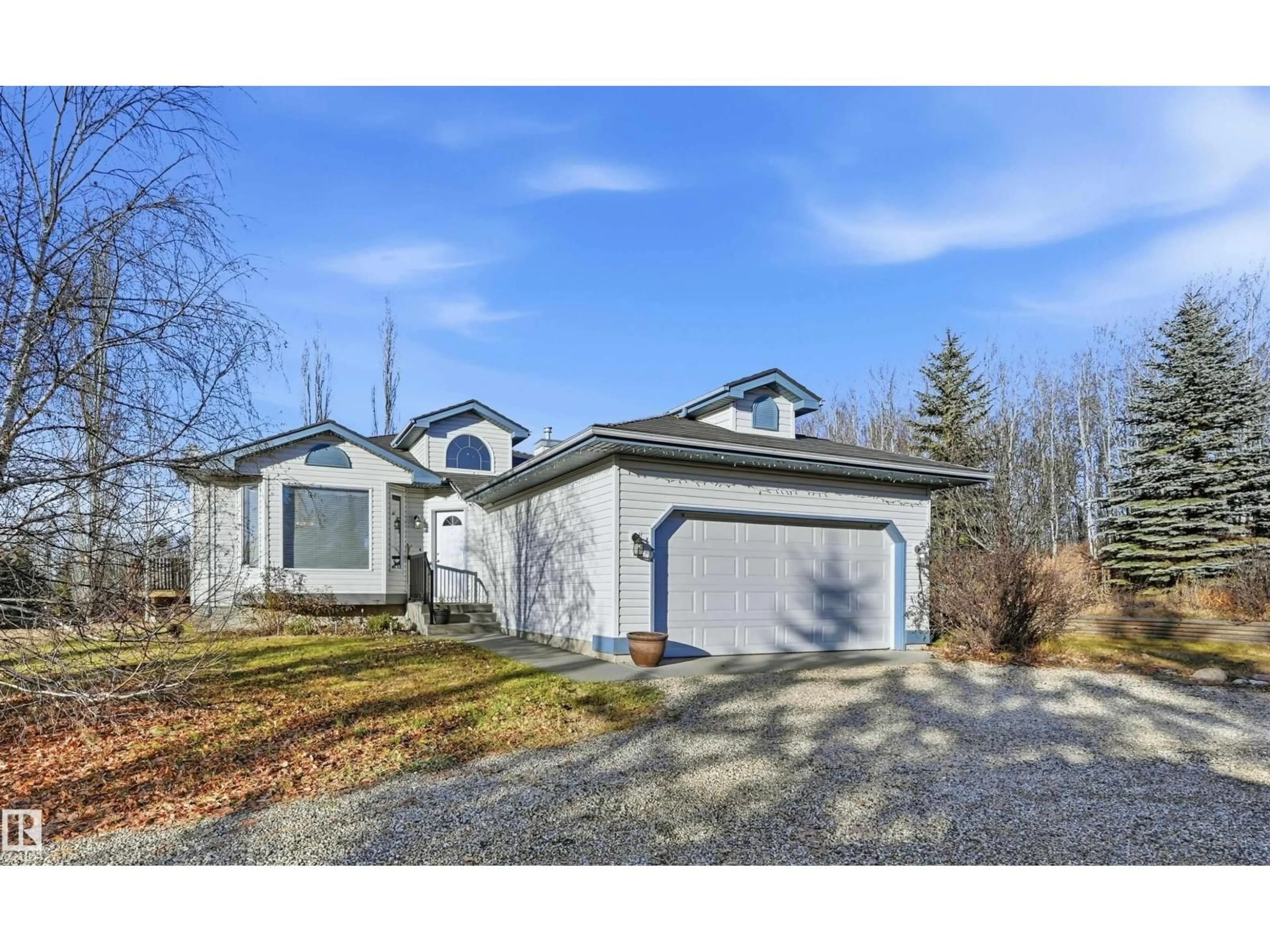 Home with vinyl exterior material, street for 370 - 50247 RGE RD 232, Rural Leduc County Alberta T4X0K9