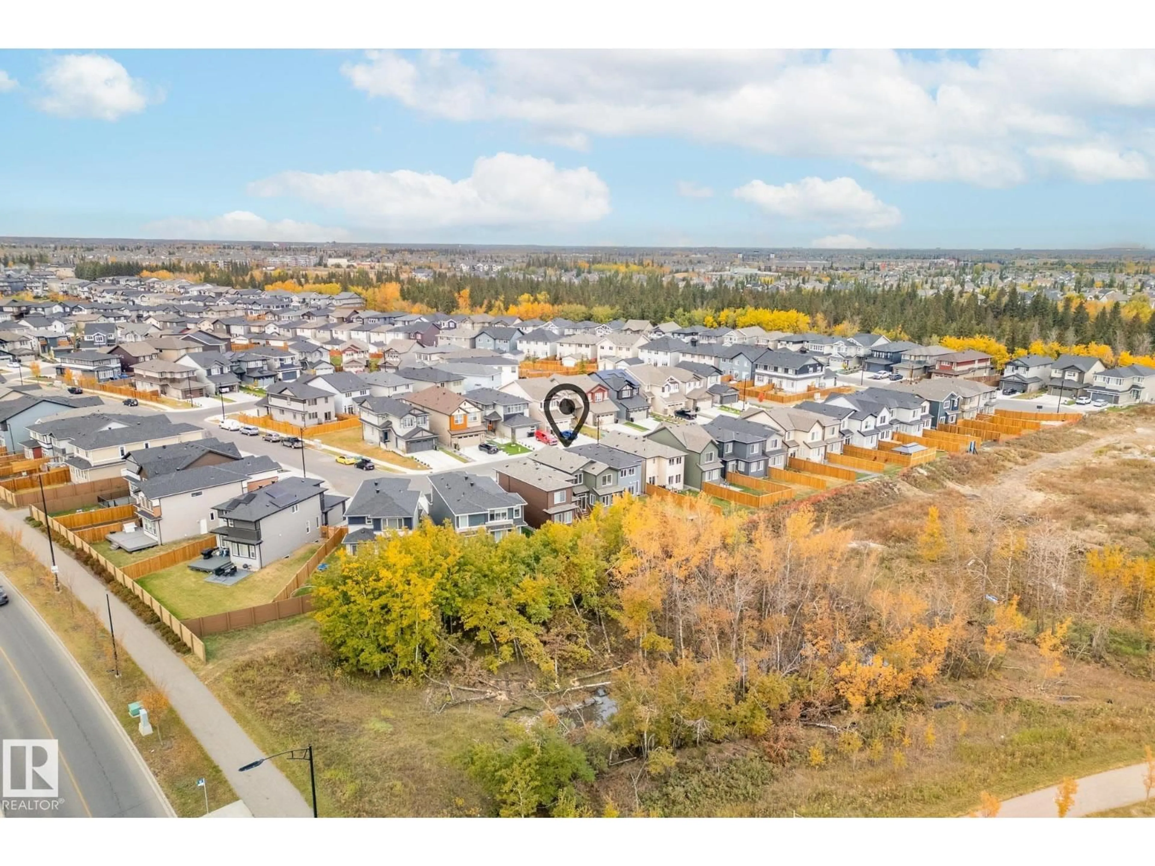 A pic from outside/outdoor area/front of a property/back of a property/a pic from drone, mountain view for 431 CONROY CR, Edmonton Alberta T6W5A9