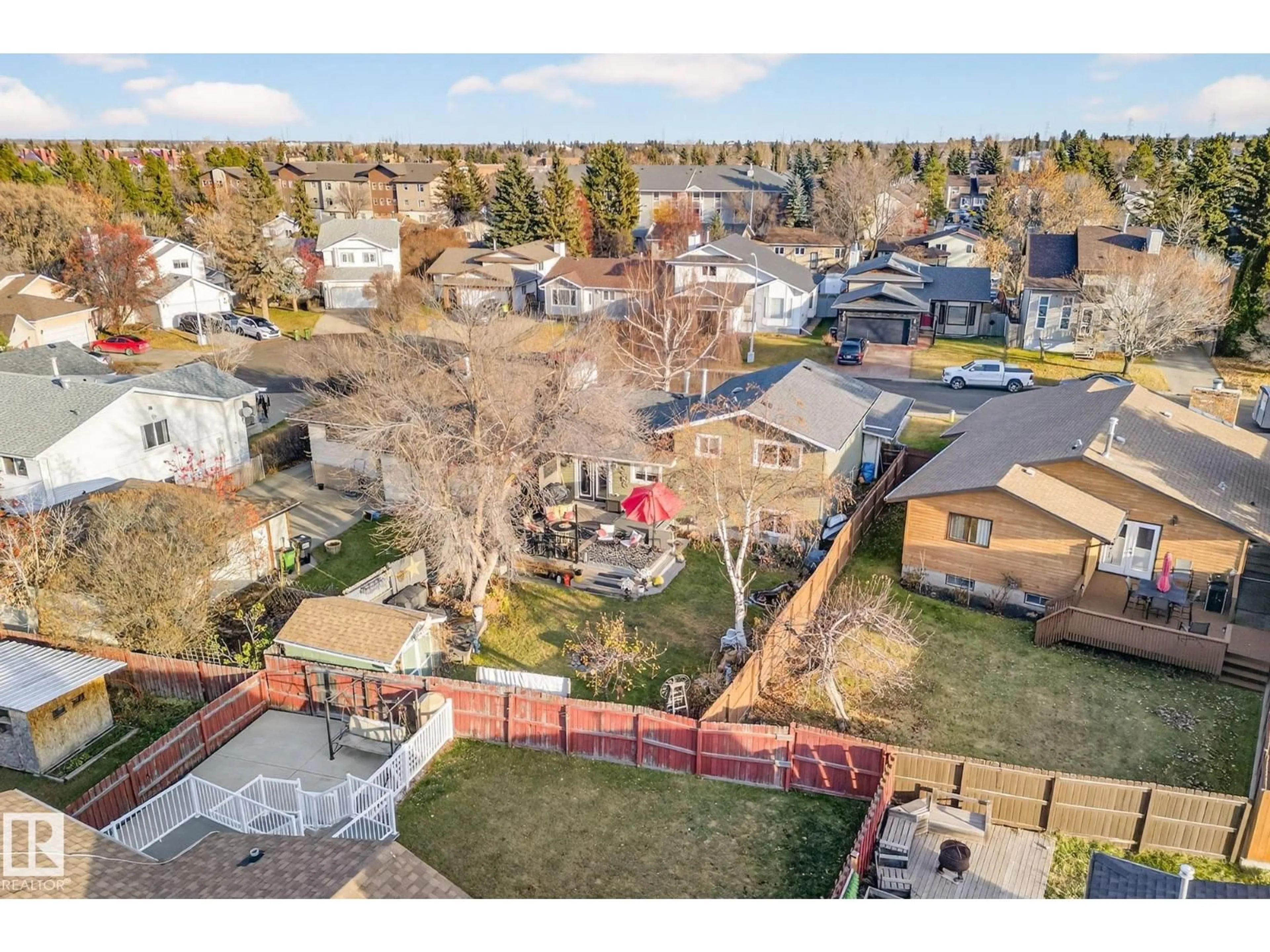 A pic from outside/outdoor area/front of a property/back of a property/a pic from drone, street for 4664 16A AV, Edmonton Alberta T6L2S2