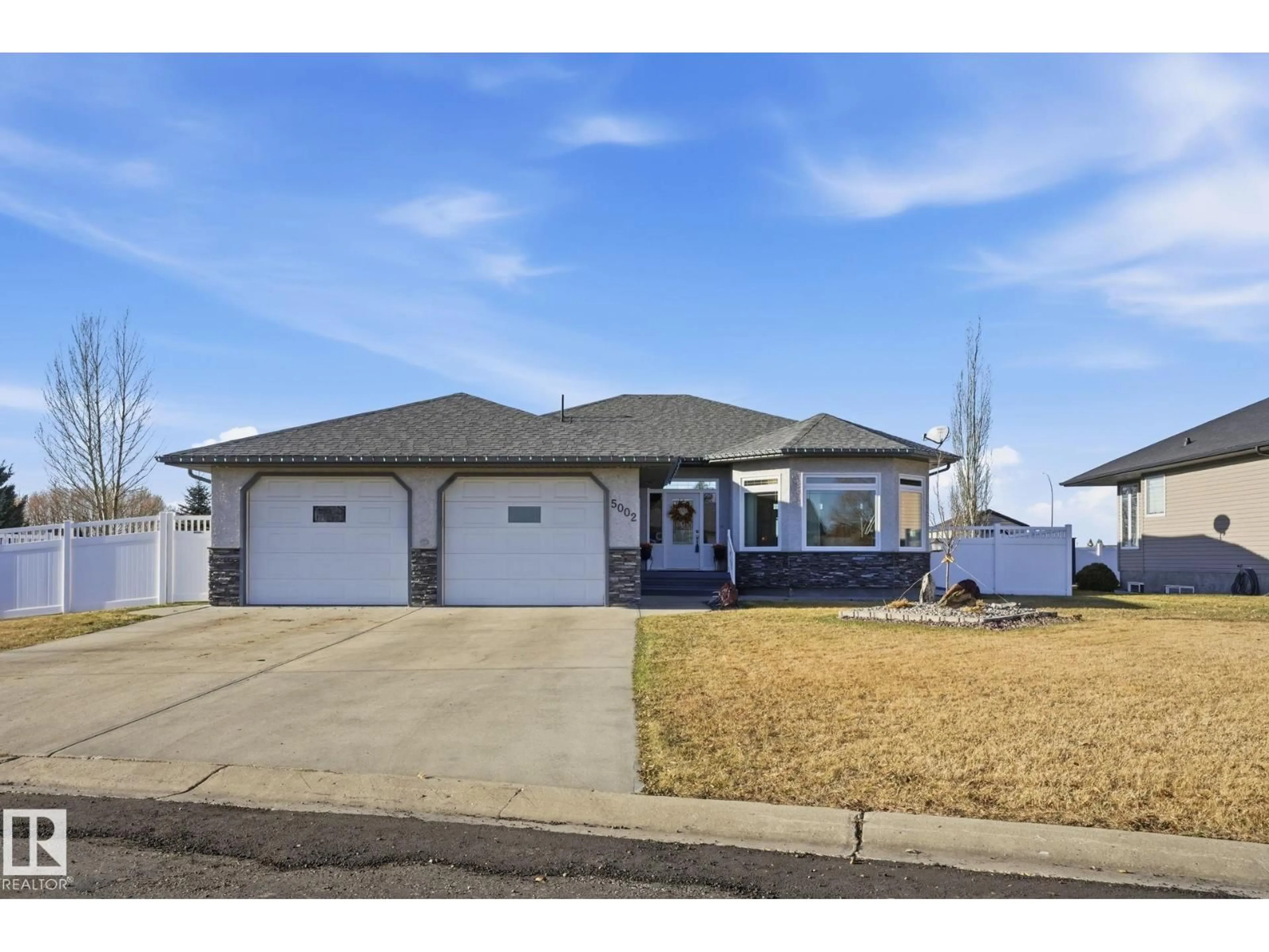 Home with vinyl exterior material, street for 5002 58 ST, Daysland Alberta T0B1A0