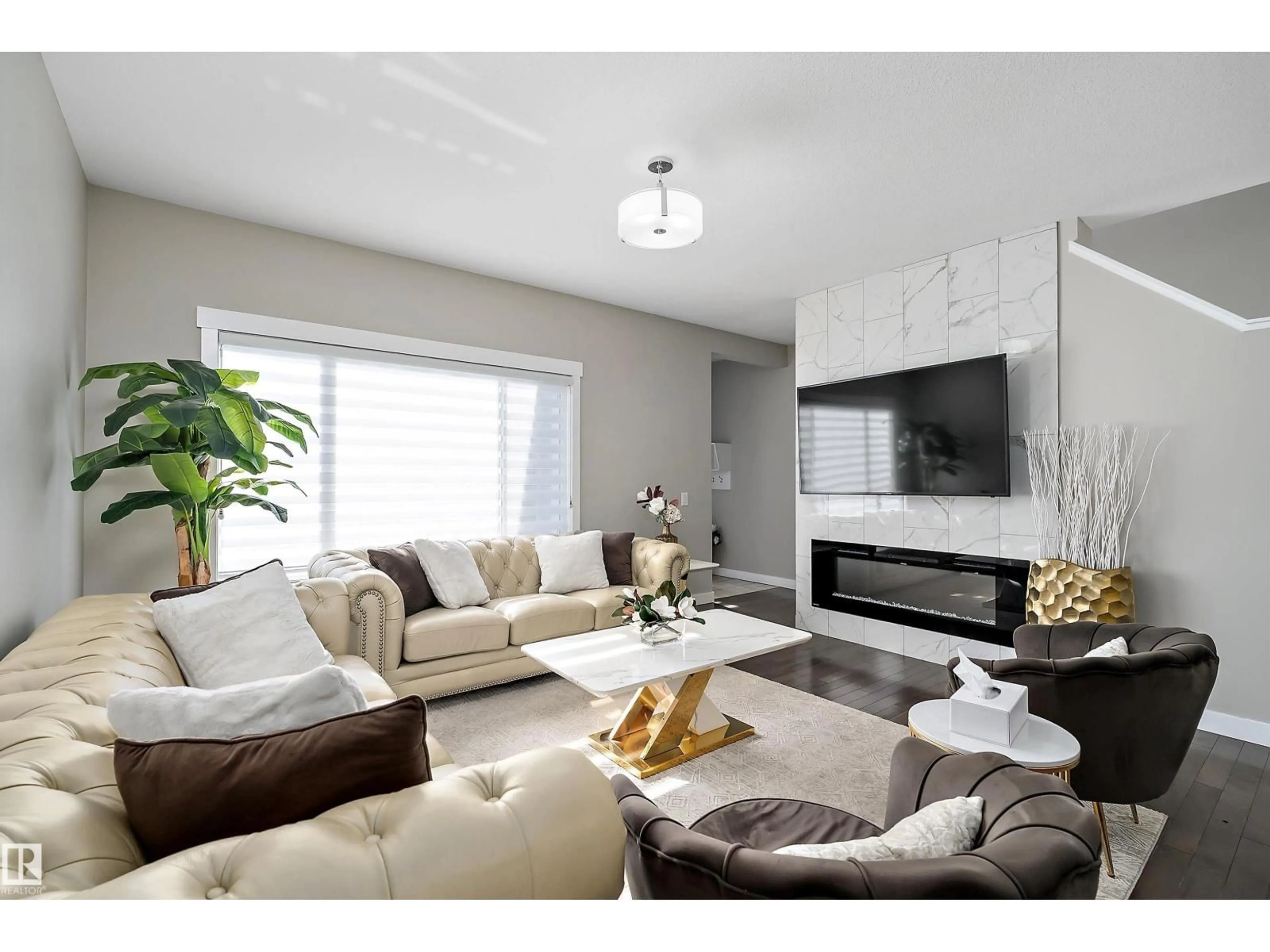 Living room with furniture, unknown for NW - 7043 174 AV, Edmonton Alberta T5Z0L3