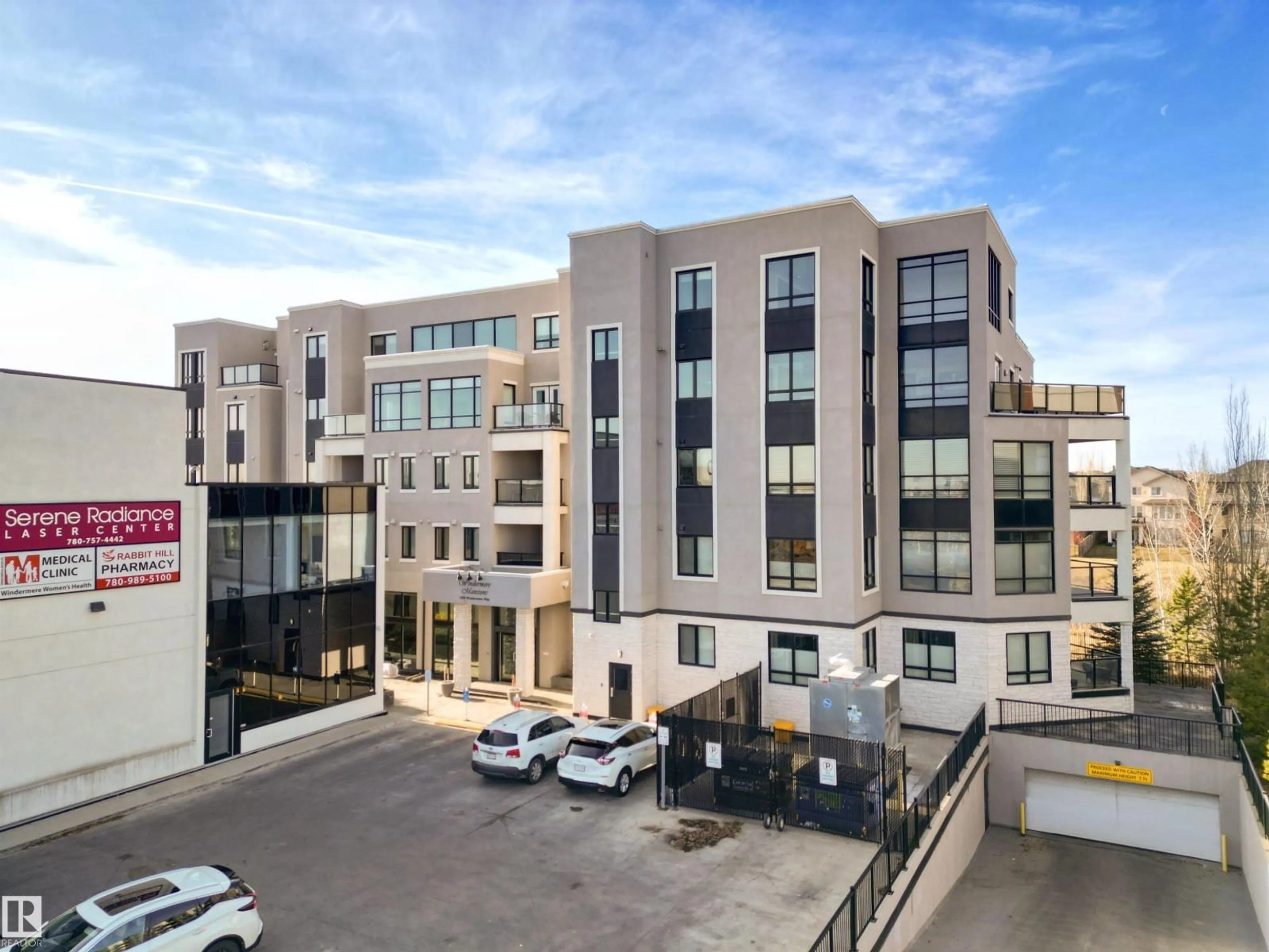 A pic from outside/outdoor area/front of a property/back of a property/a pic from drone, building for #408 - 1350 WINDERMERE WY, Edmonton Alberta T6W2J3