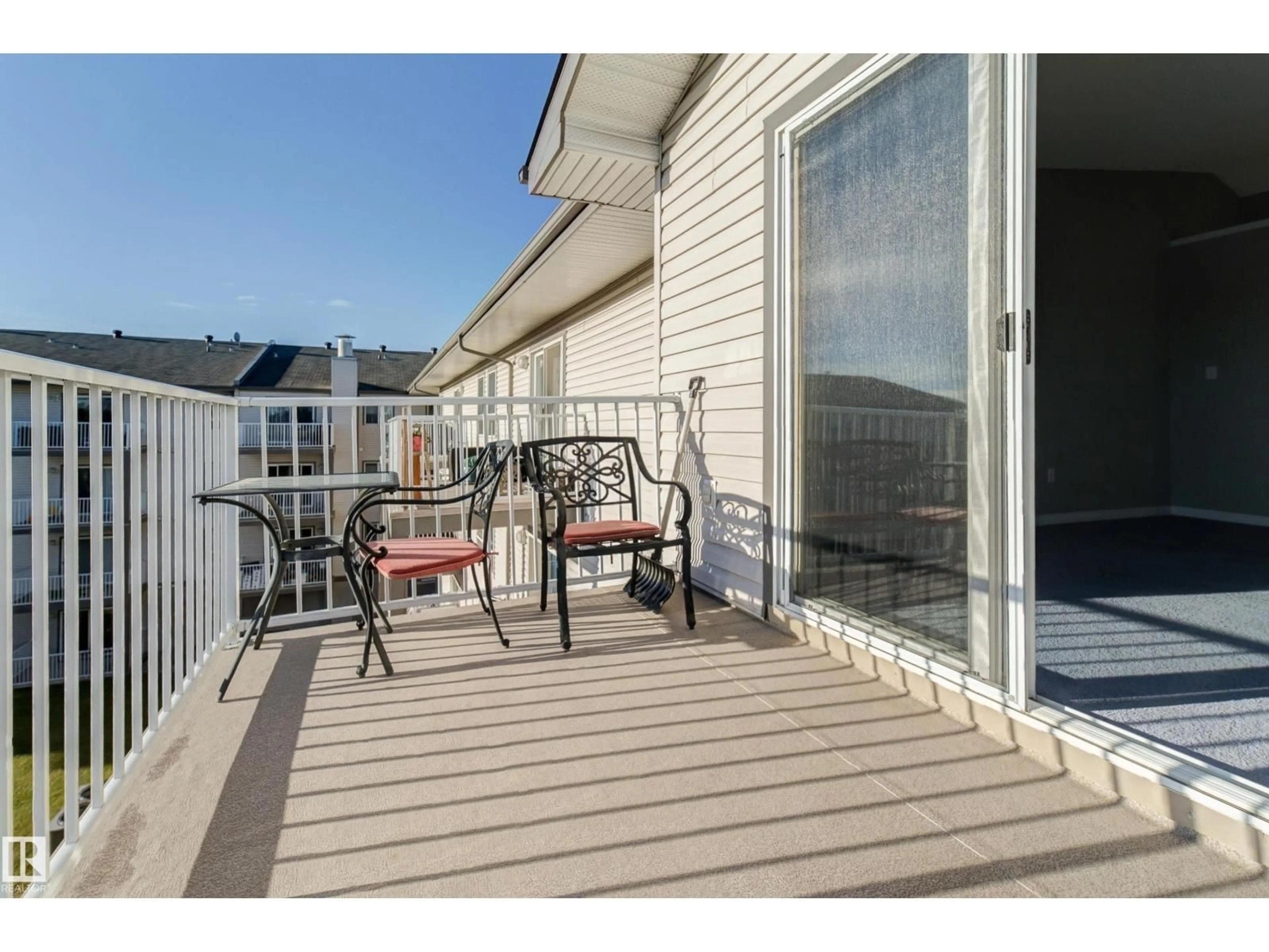 Patio, water/lake/river/ocean view for #409 - 151 EDWARDS DR, Edmonton Alberta T6X1N5