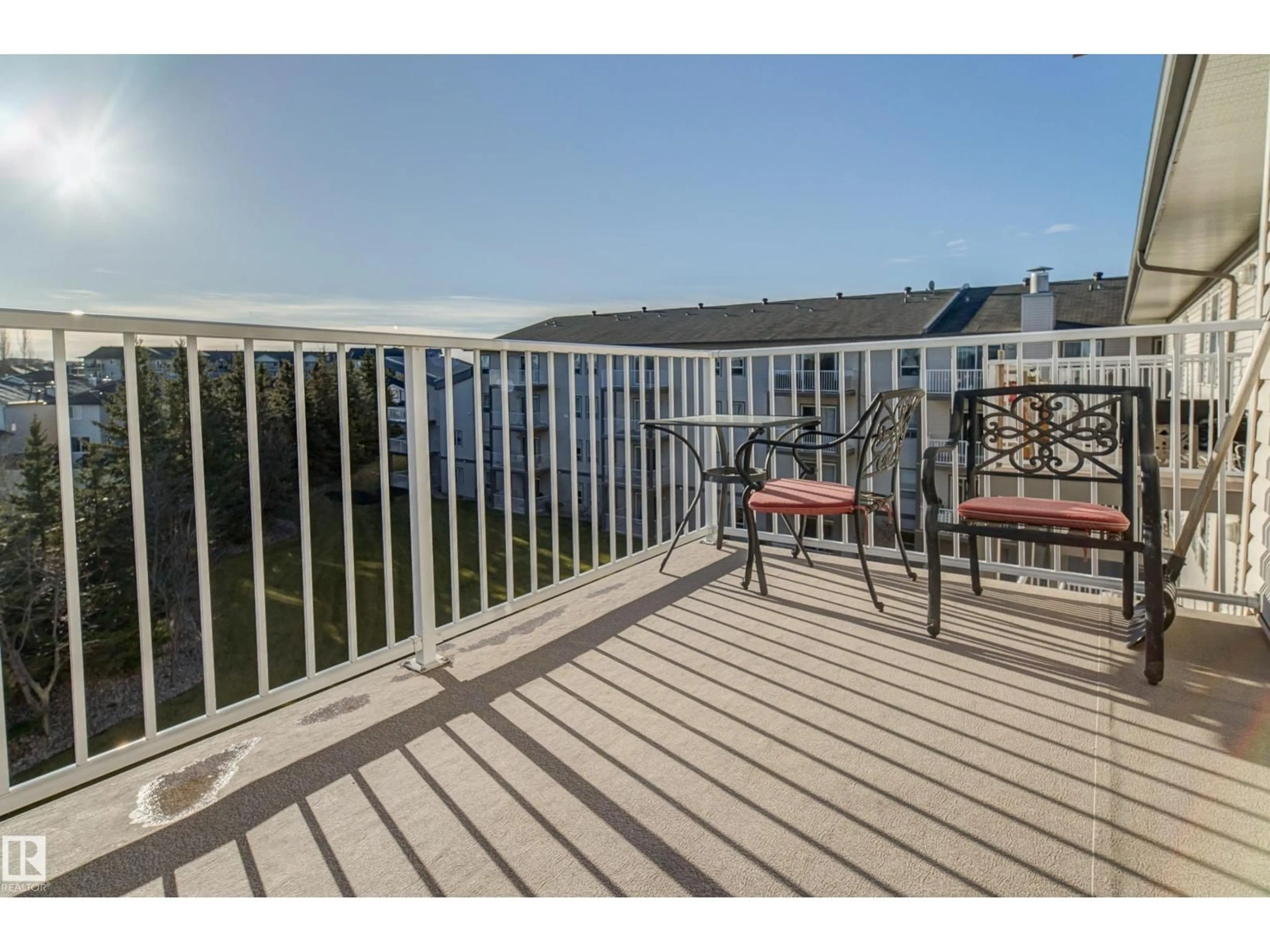 Patio, water/lake/river/ocean view for #409 - 151 EDWARDS DR, Edmonton Alberta T6X1N5