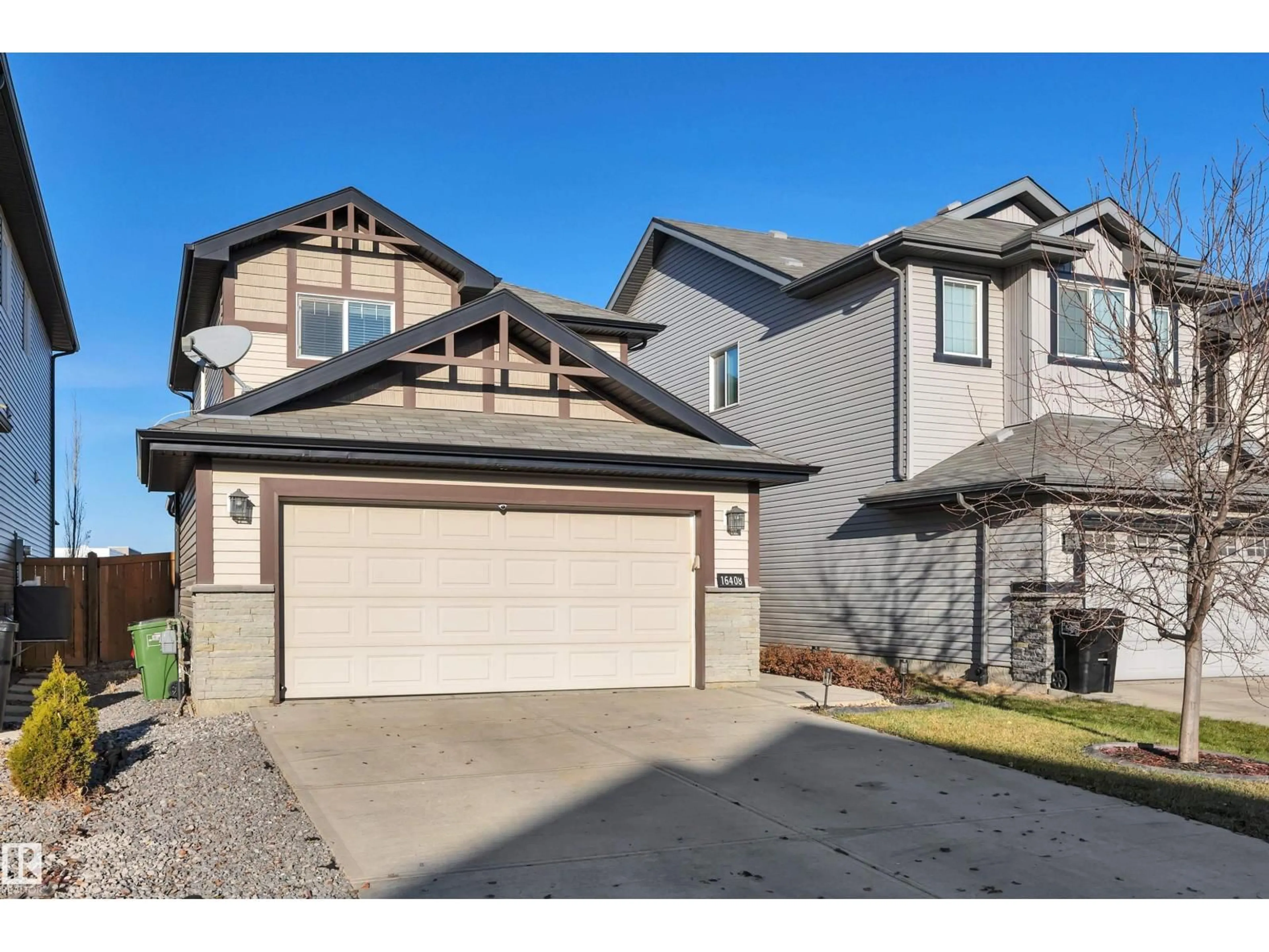Home with vinyl exterior material, street for SW - 16408 12 AV, Edmonton Alberta T6W3K4