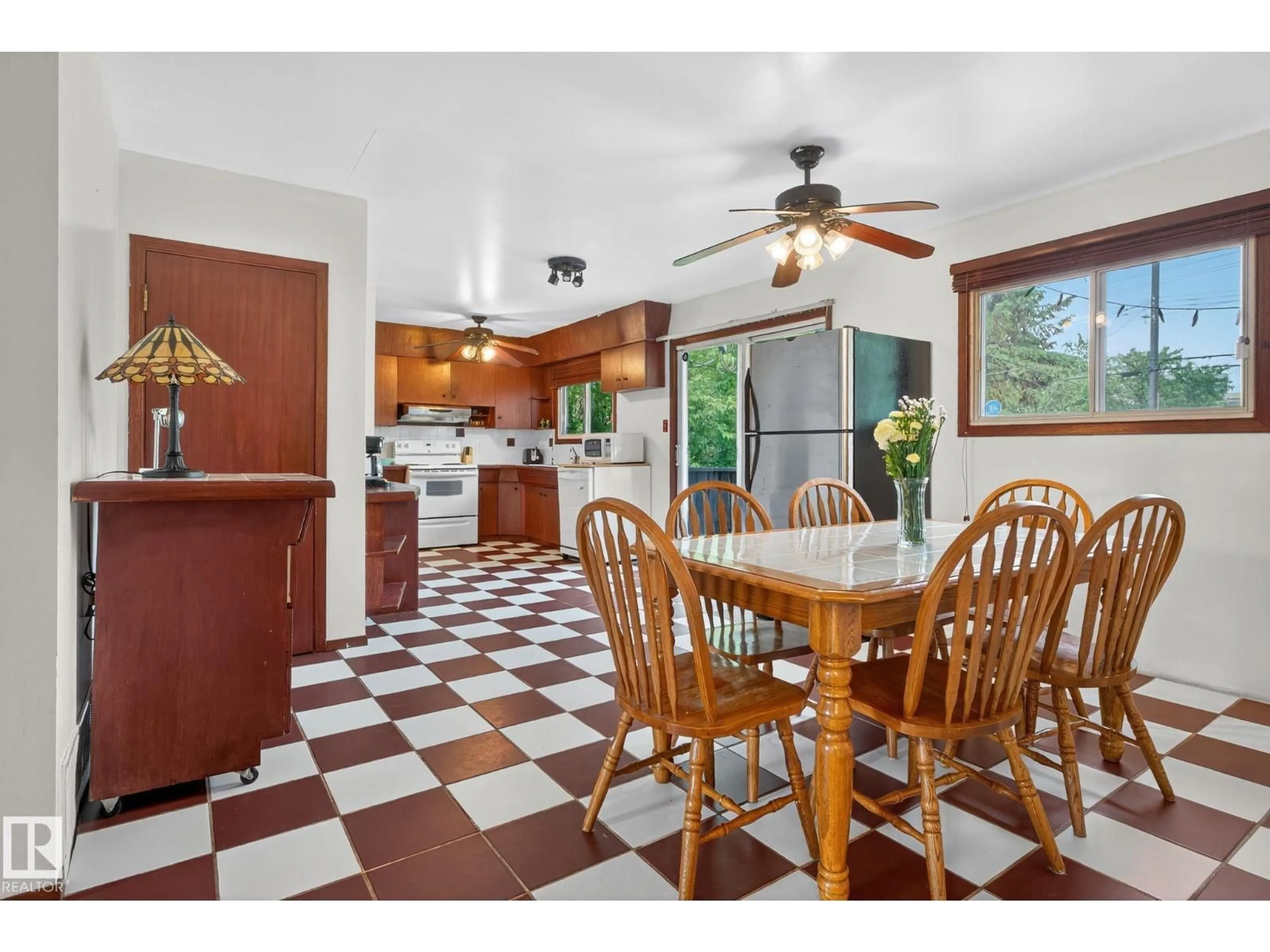 Open concept kitchen, ceramic/tile floor for 9603 52 ST, Edmonton Alberta T6B1G8