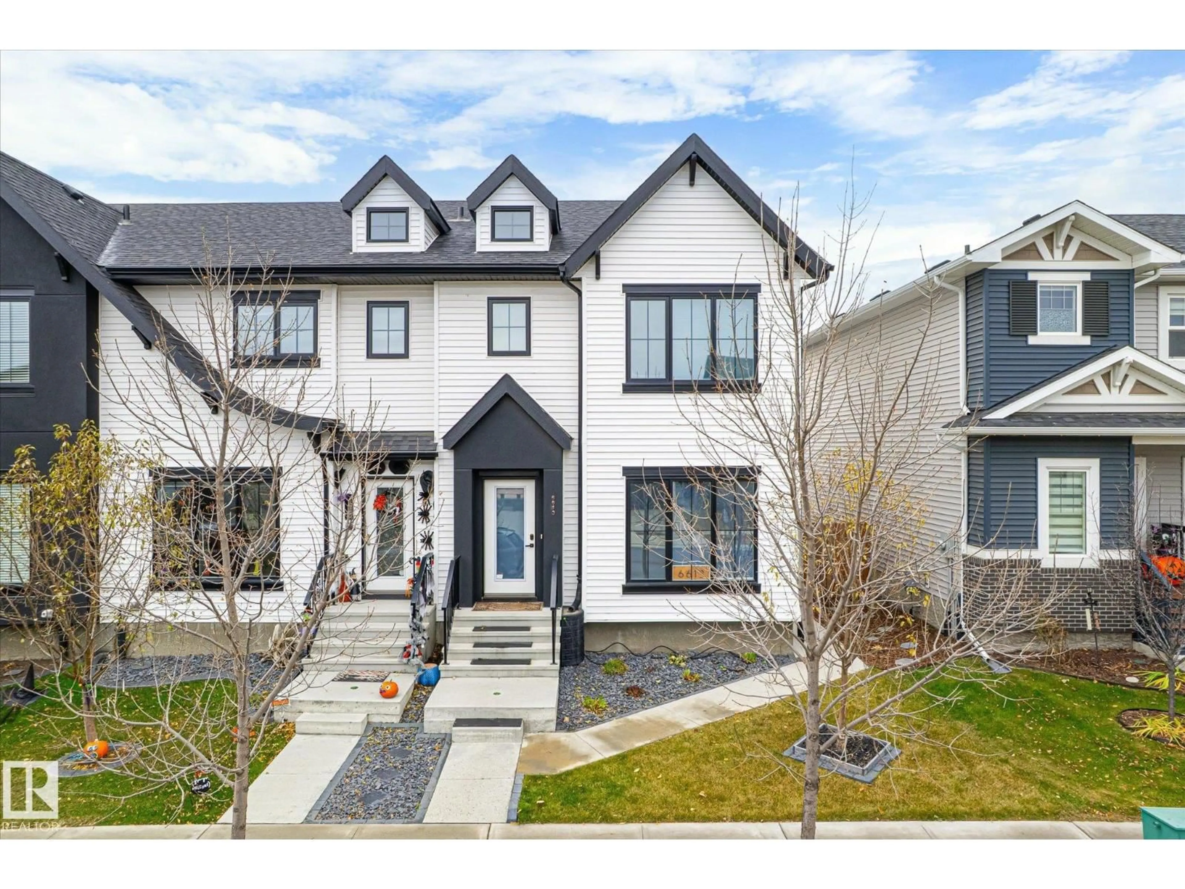 Home with vinyl exterior material, street for 6613 47 AV, Beaumont Alberta T4X2X5