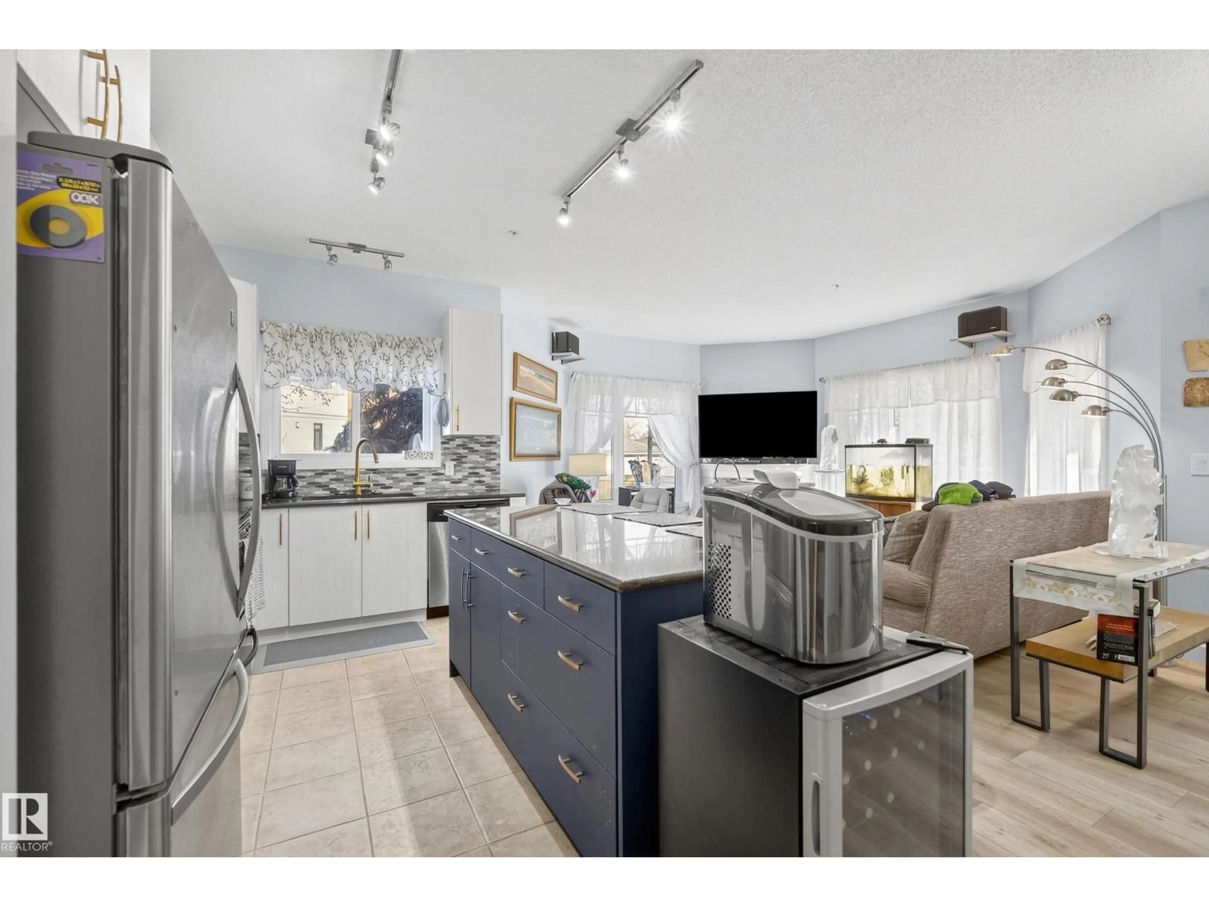 Open concept kitchen, ceramic/tile floor for #106 - 8931 156 ST, Edmonton Alberta T5R1Y6