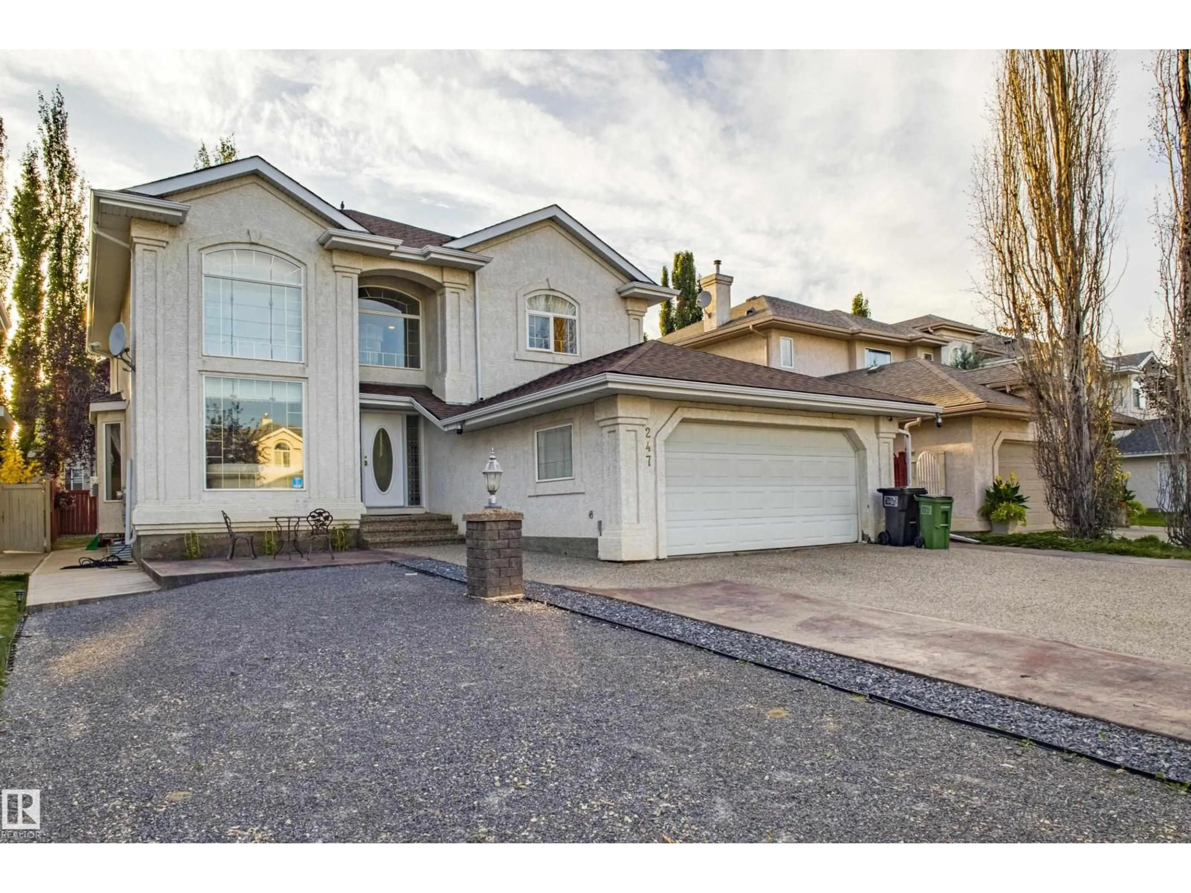 Home with vinyl exterior material, street for 247 LINDSAY CR, Edmonton Alberta T6R2T2