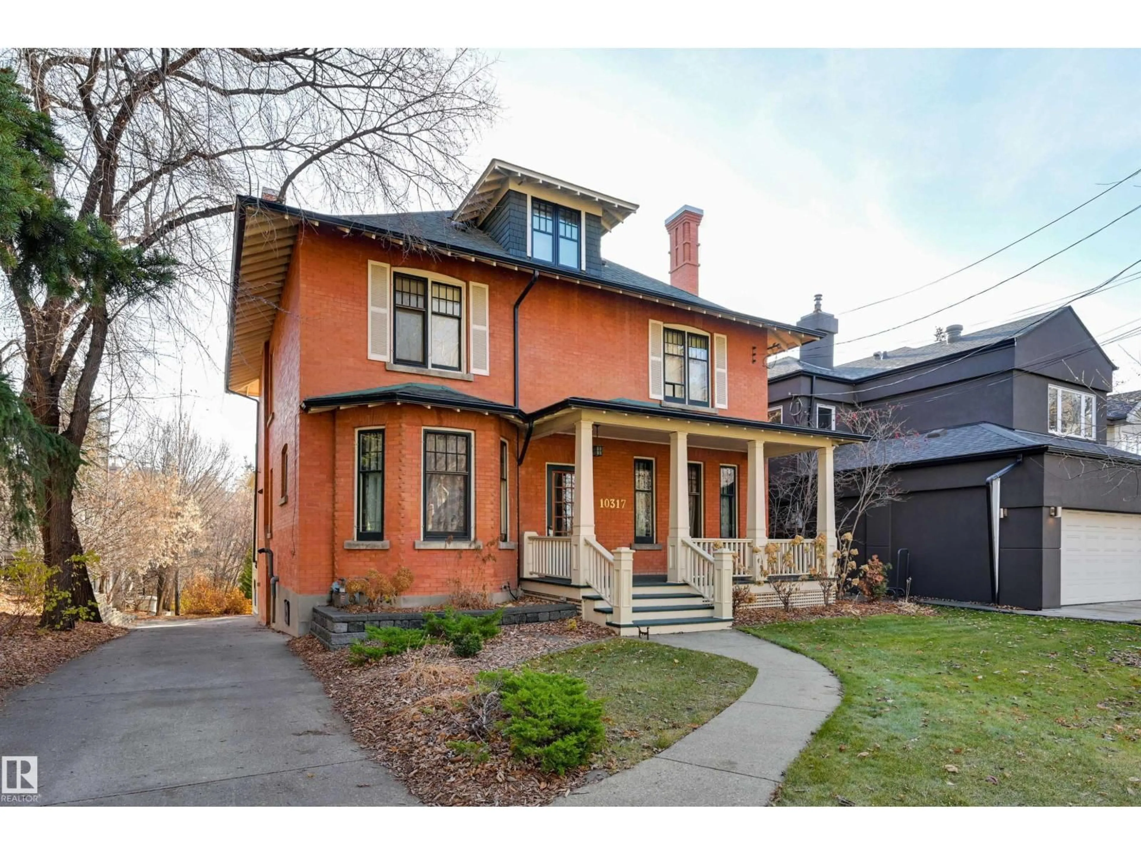 Home with brick exterior material, street for 10317 VILLA AV, Edmonton Alberta T5N3T8