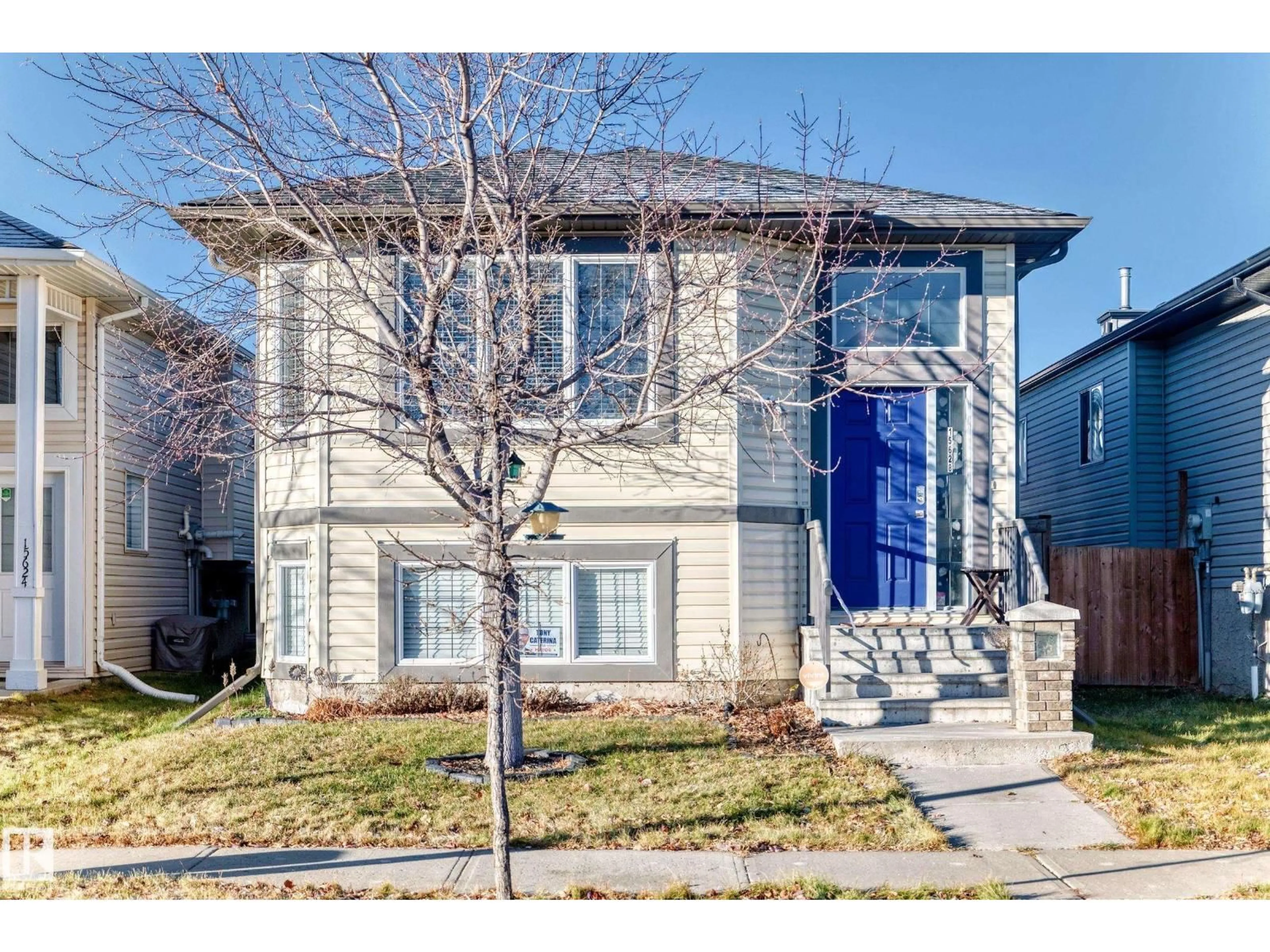 Home with vinyl exterior material, street for 15628 44 ST, Edmonton Alberta T5Y3H2