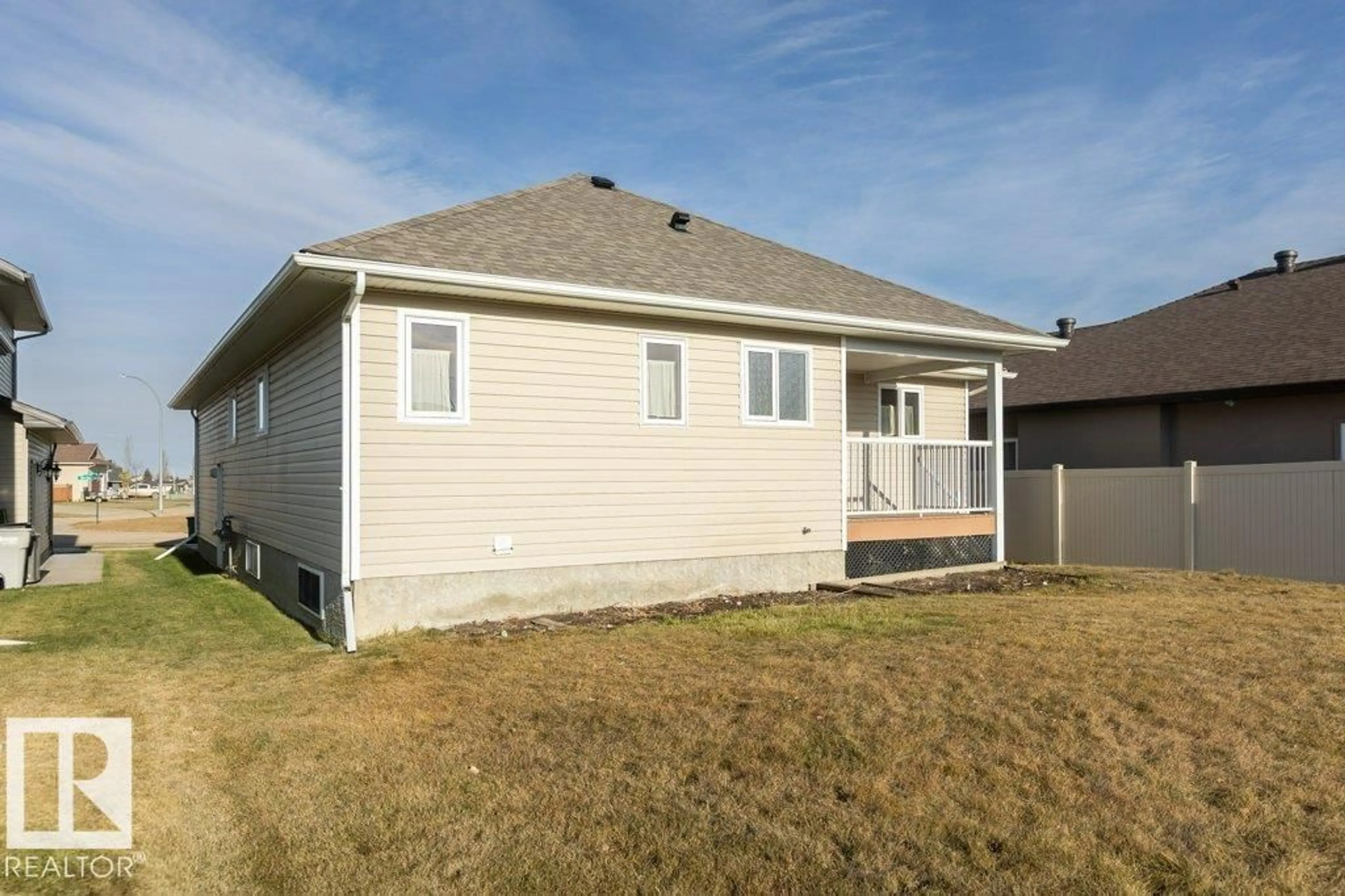 Home with vinyl exterior material, street for 11107 103 ST, Westlock Alberta T7P1G6