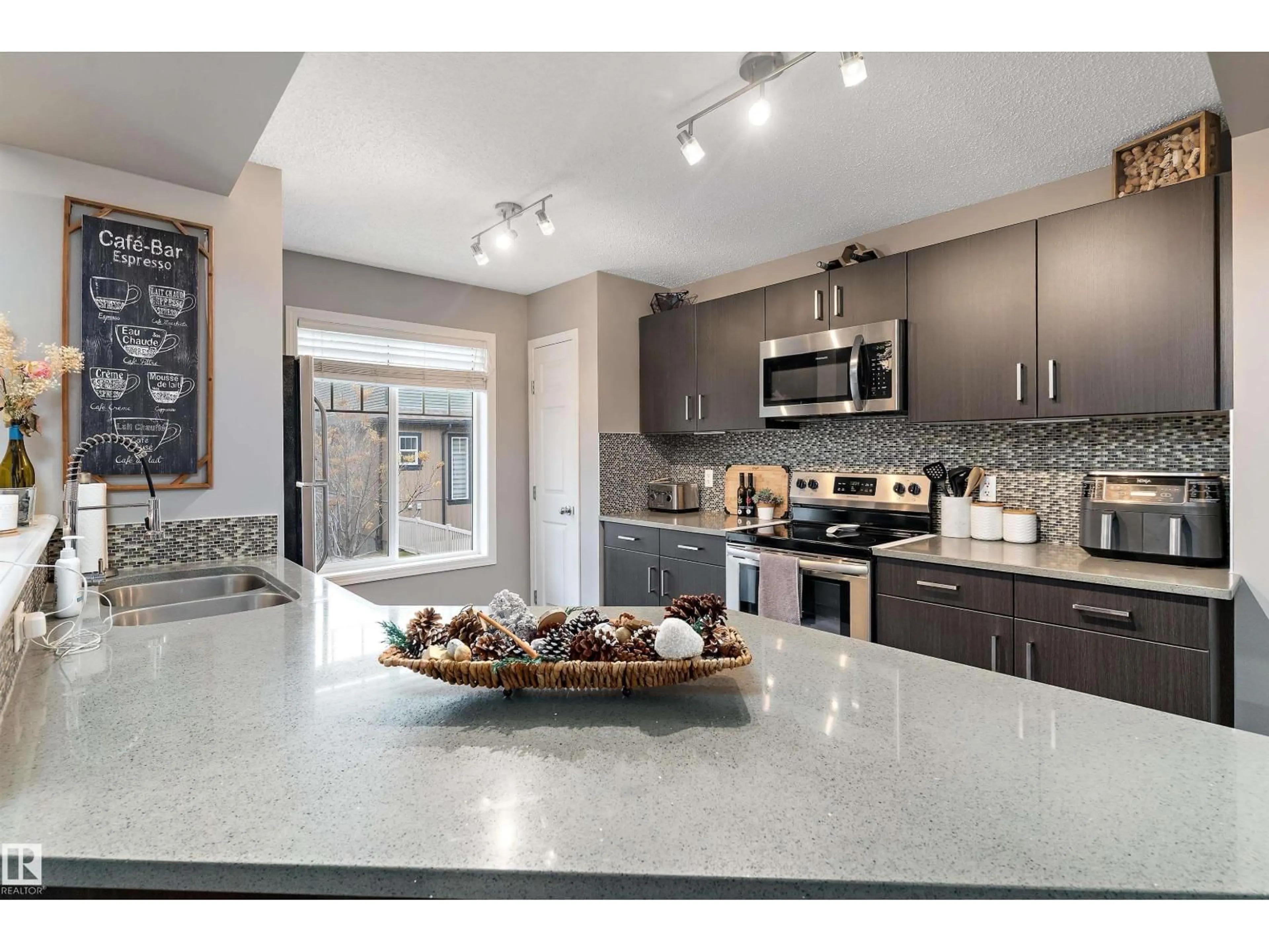 Open concept kitchen, ceramic/tile floor for #97 - 3305 ORCHARDS LI, Edmonton Alberta T6X2H1