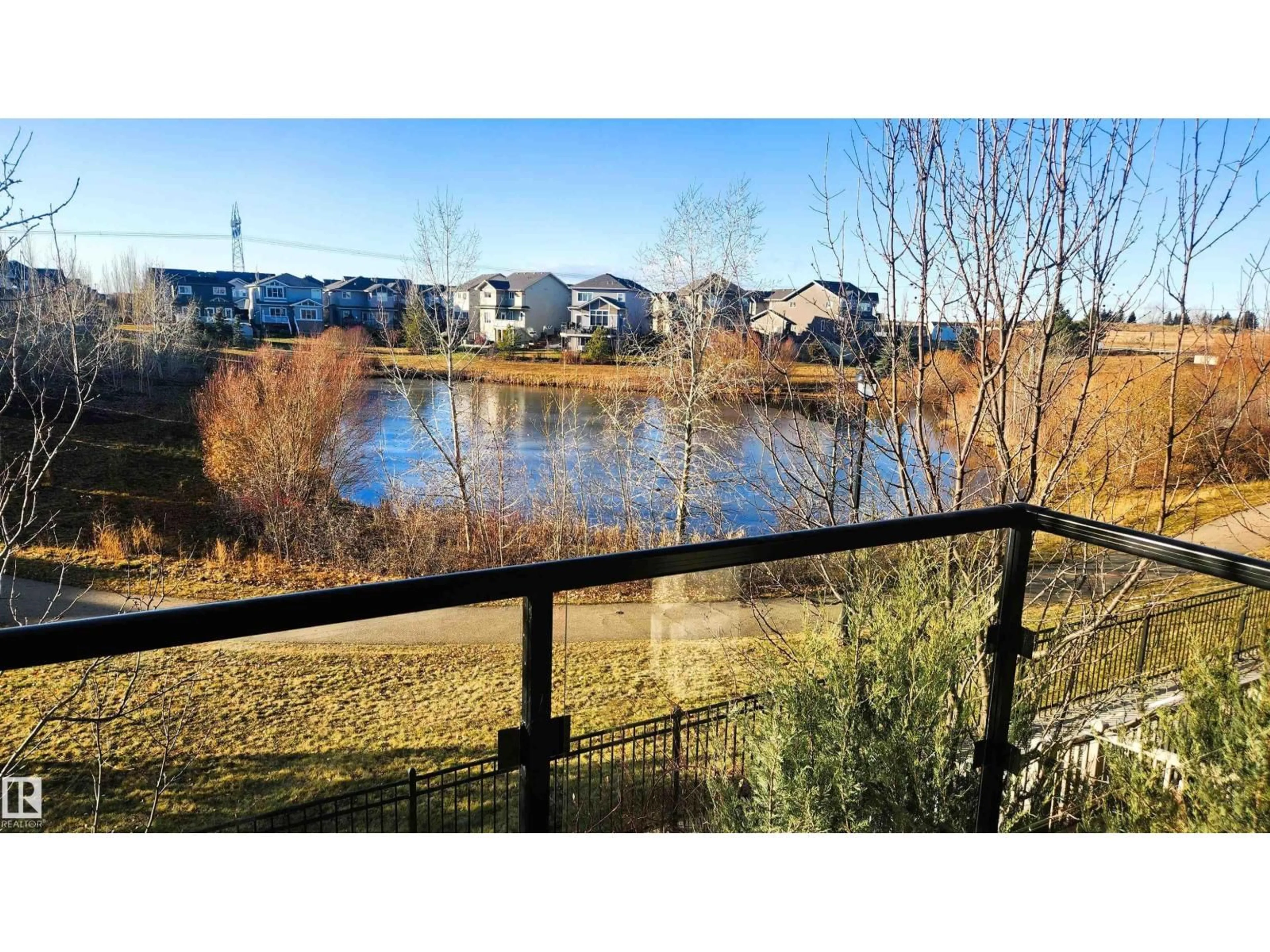 A pic from outside/outdoor area/front of a property/back of a property/a pic from drone, water/lake/river/ocean view for 32 1030 CHAPPELLE BV, Edmonton Alberta T6W2K7