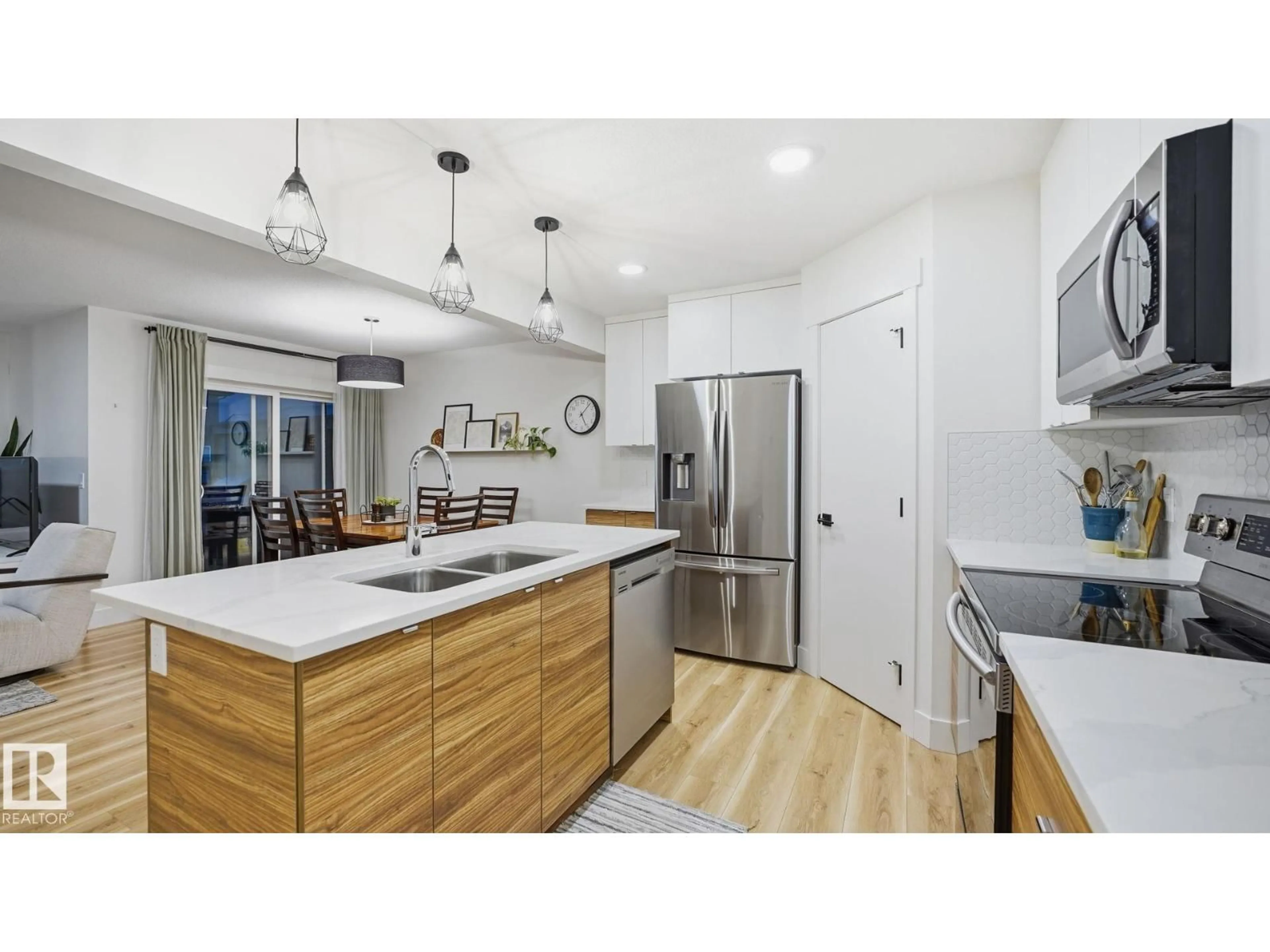 Open concept kitchen, wood/laminate floor for 368 SAVOY CR, Sherwood Park Alberta T8H2X2