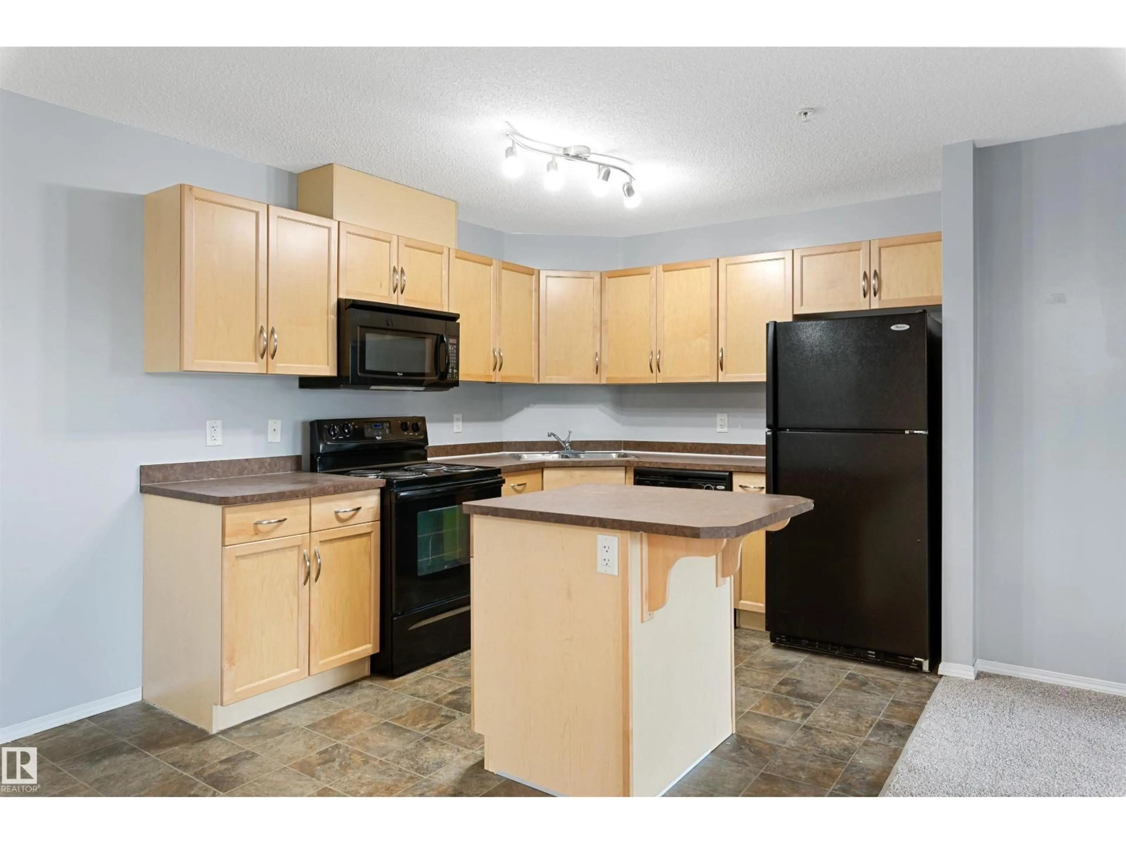 Standard kitchen, unknown for #111 - 5951 165 AV, Edmonton Alberta T5Y0J6