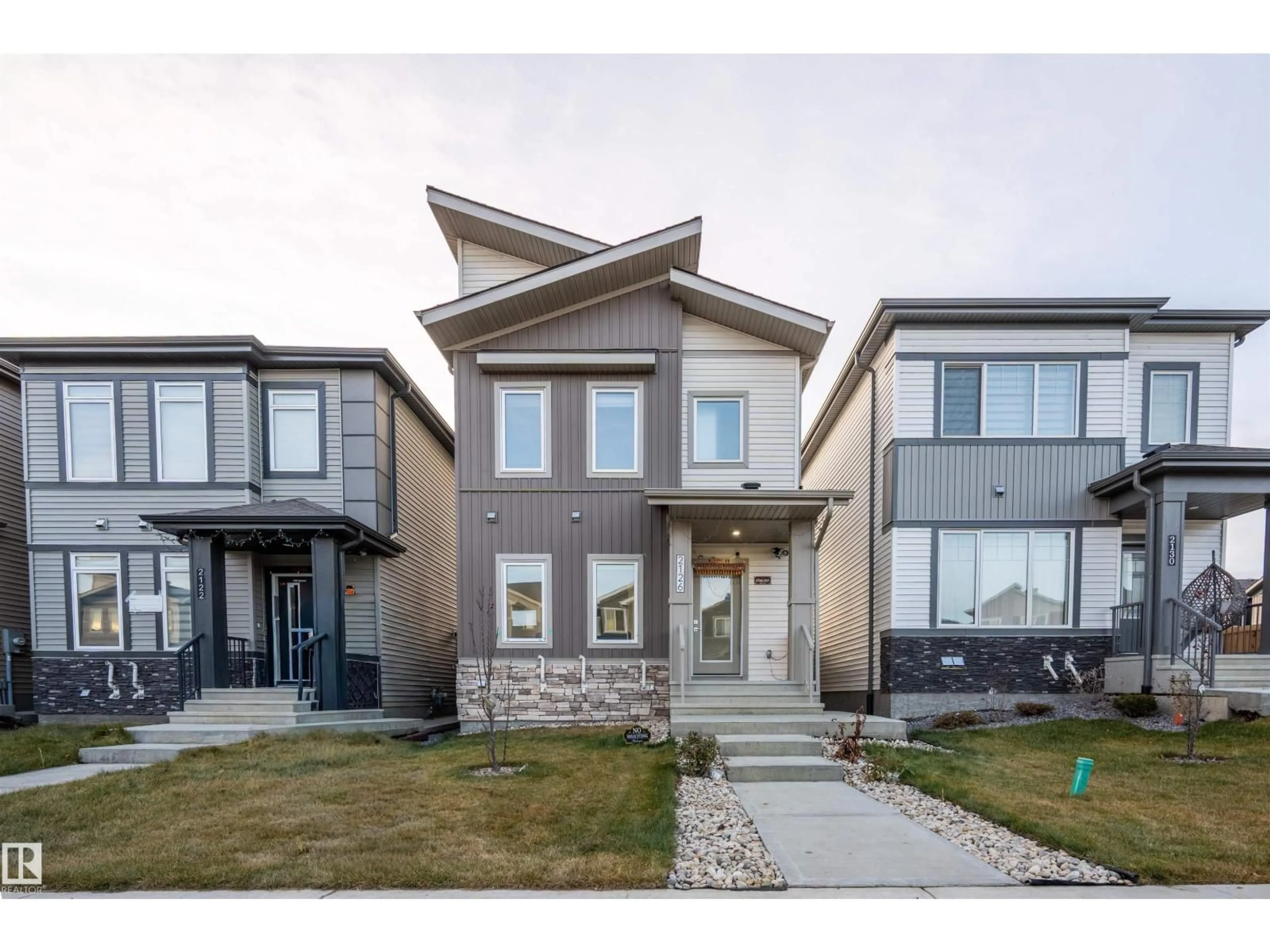 Home with brick exterior material, street for NW - 2126 209A ST, Edmonton Alberta T6M3C7