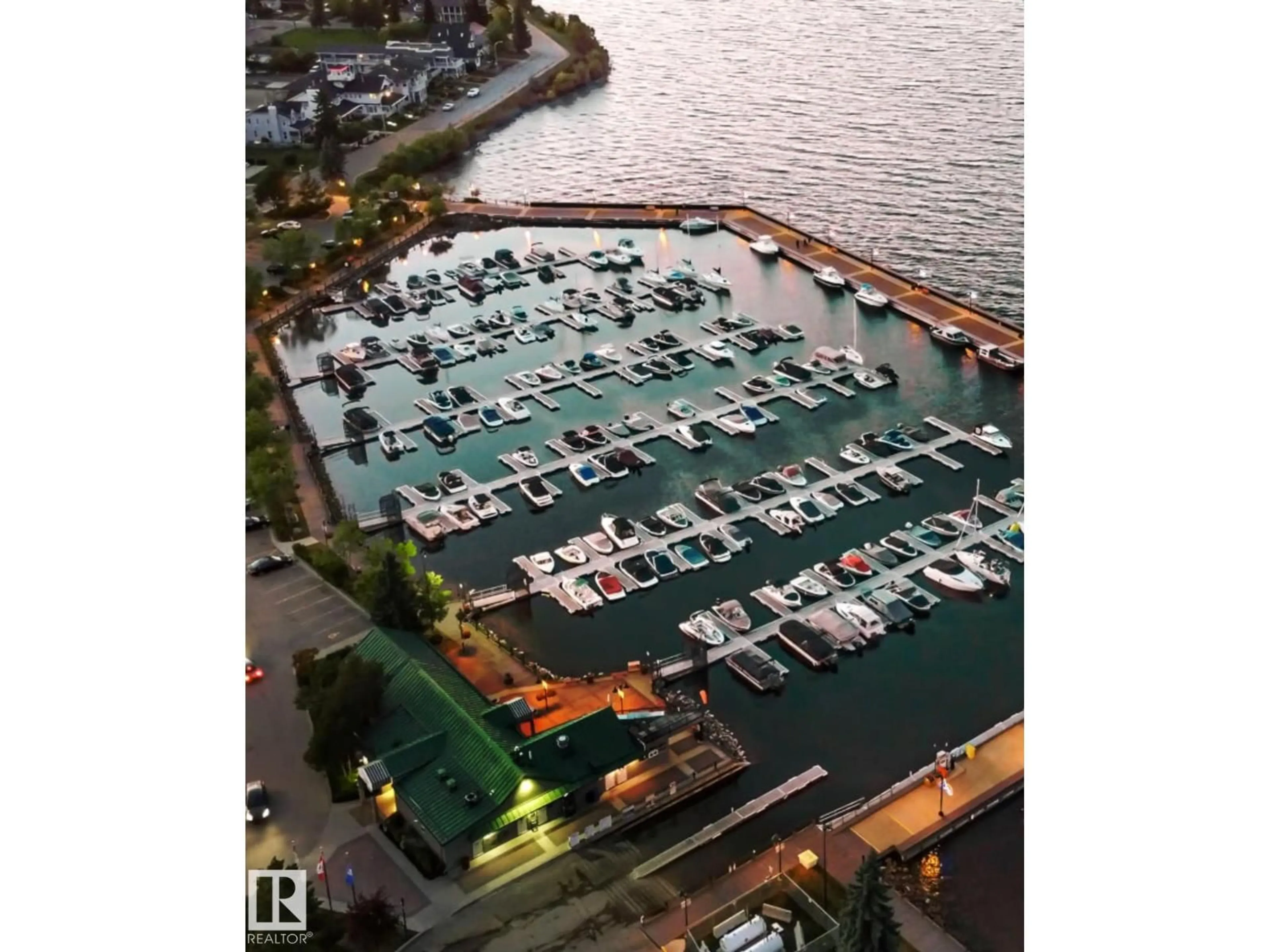 A pic from outside/outdoor area/front of a property/back of a property/a pic from drone, water/lake/river/ocean view for 607 LAKESHORE DR, Cold Lake Alberta T9M1A2