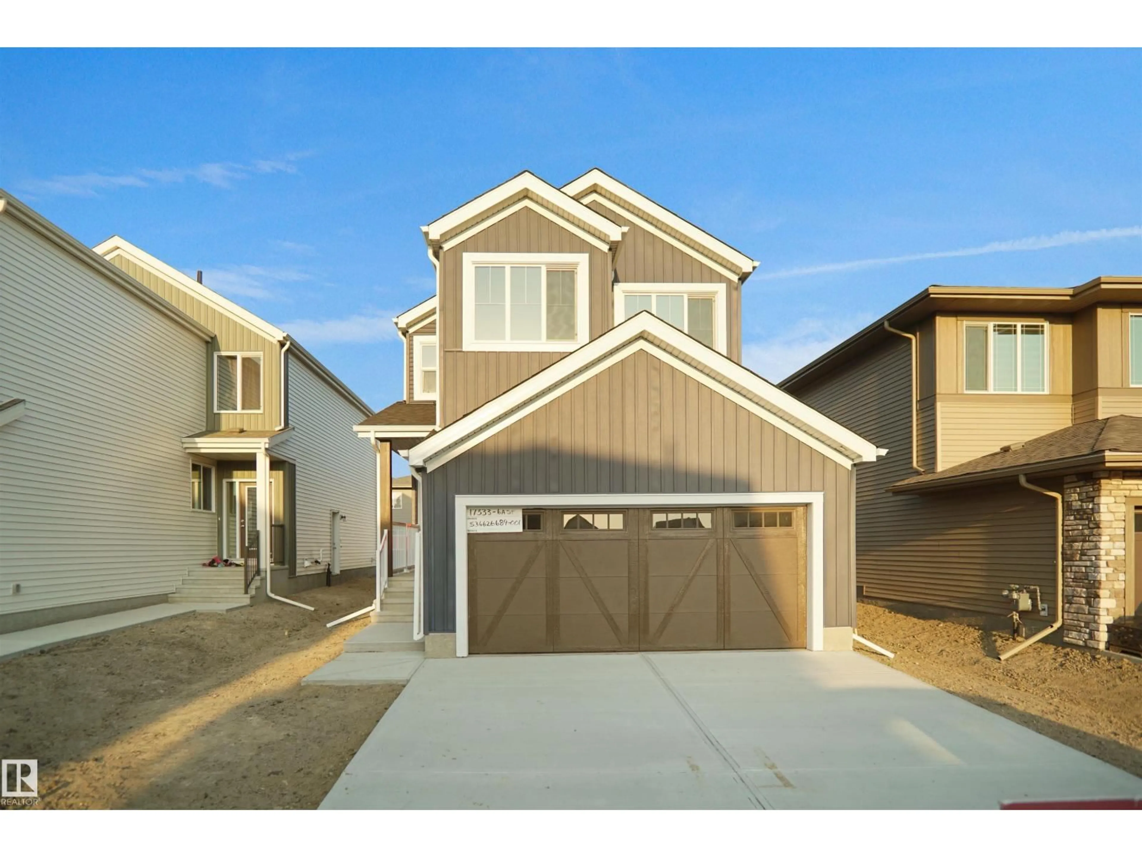 Home with vinyl exterior material, street for NE - 17333 6A ST, Edmonton Alberta T5Y4E9