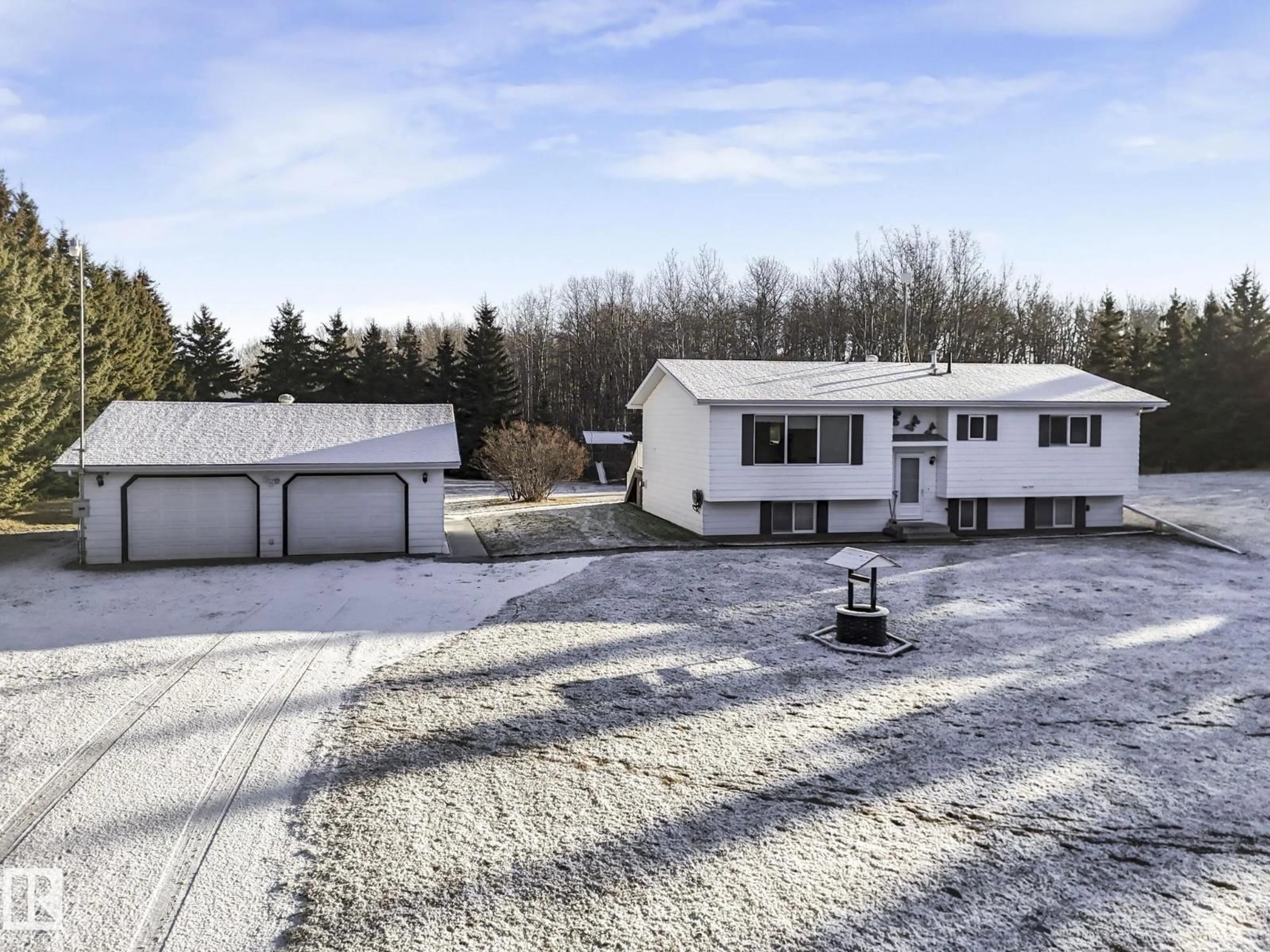A pic from outside/outdoor area/front of a property/back of a property/a pic from drone, unknown for #35 - 53417 RGE ROAD 14, Rural Parkland County Alberta T7Y0B5