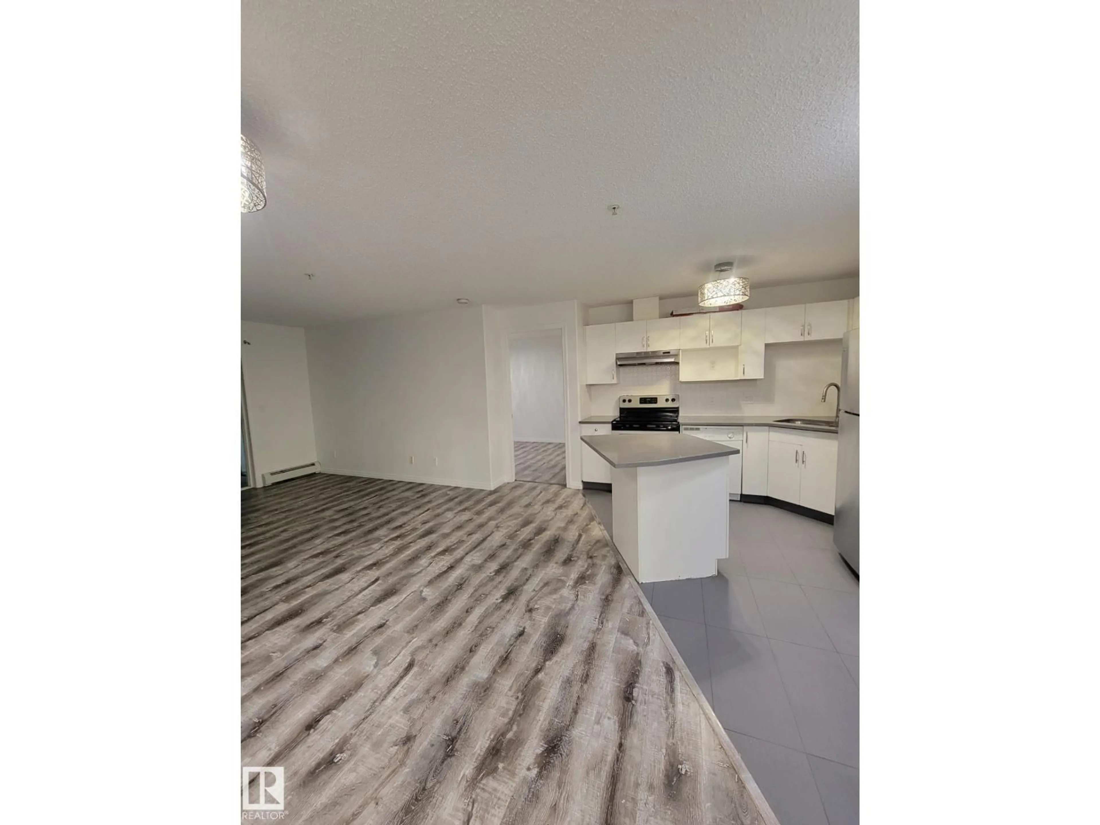 Open concept kitchen, unknown for #234 - 16221 95 ST, Edmonton Alberta T5Z3V3