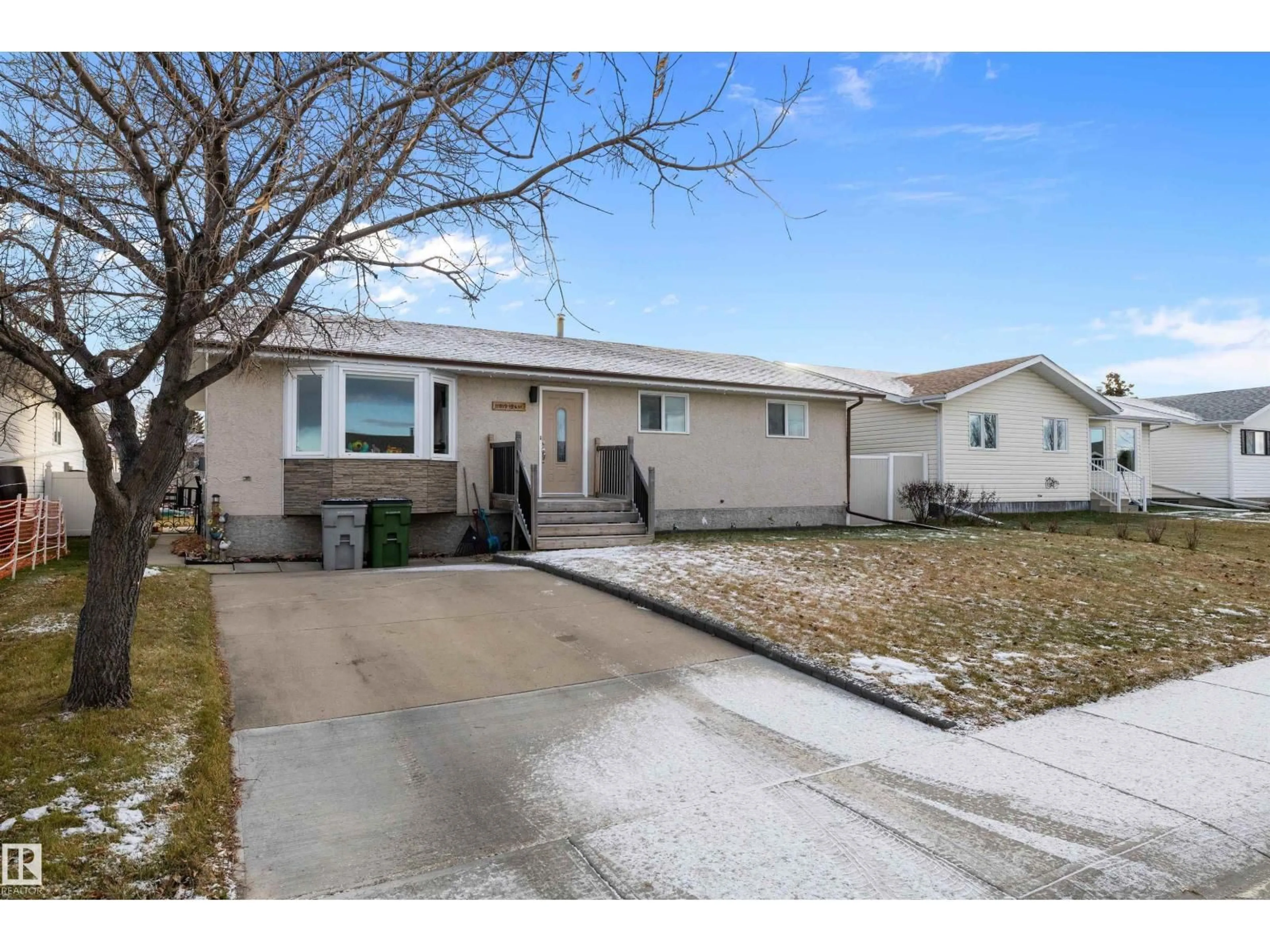 Home with vinyl exterior material, street for 11019 104 ST, Westlock Alberta T7P1G5