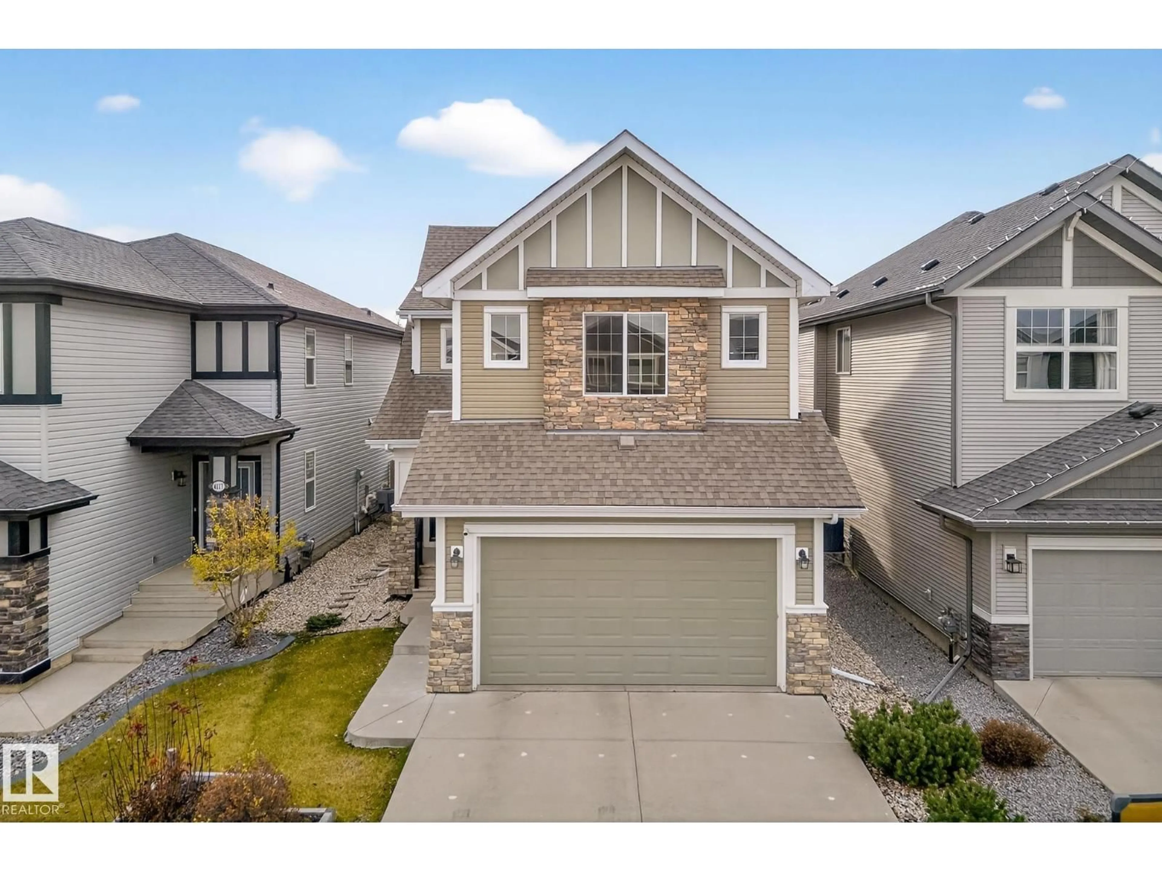 A pic from outside/outdoor area/front of a property/back of a property/a pic from drone, street for 6121 175A AV, Edmonton Alberta T5Y3N8