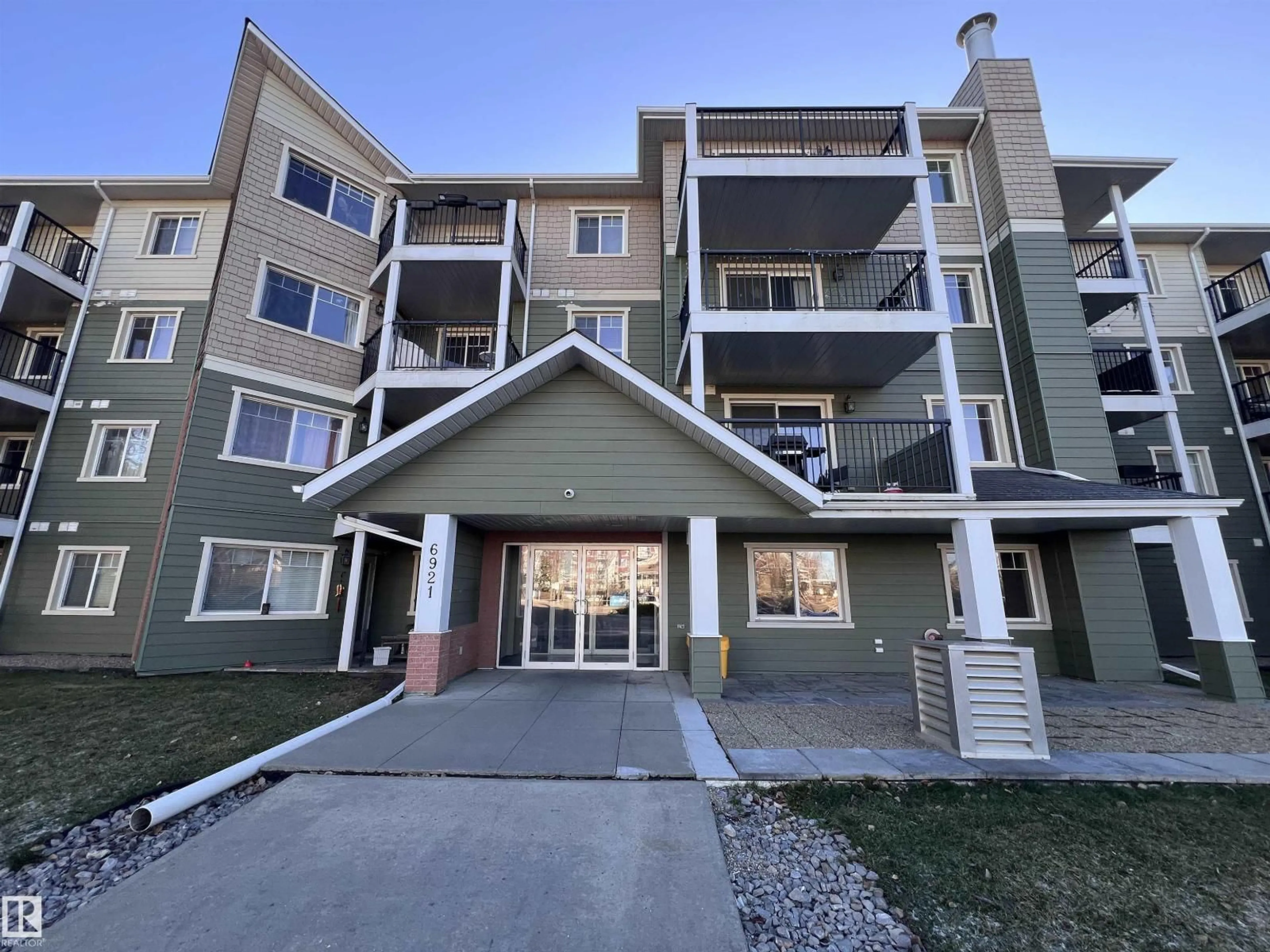 A pic from outside/outdoor area/front of a property/back of a property/a pic from drone, mountain view for 302 - 6921 199 ST NW, Edmonton Alberta T5T3X7