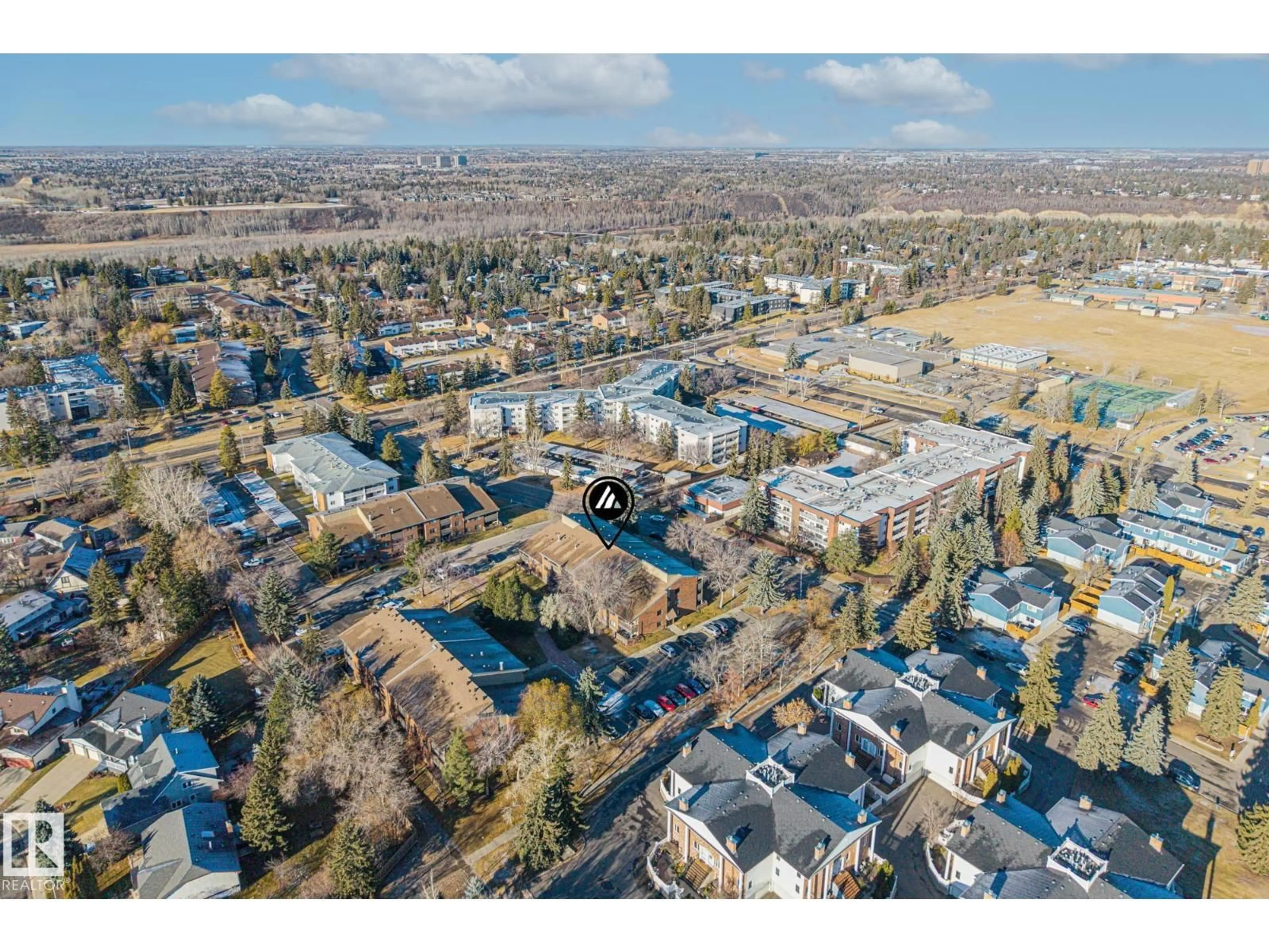 A pic from outside/outdoor area/front of a property/back of a property/a pic from drone, street for #209 - 14811 51 AV, Edmonton Alberta T6H5G4