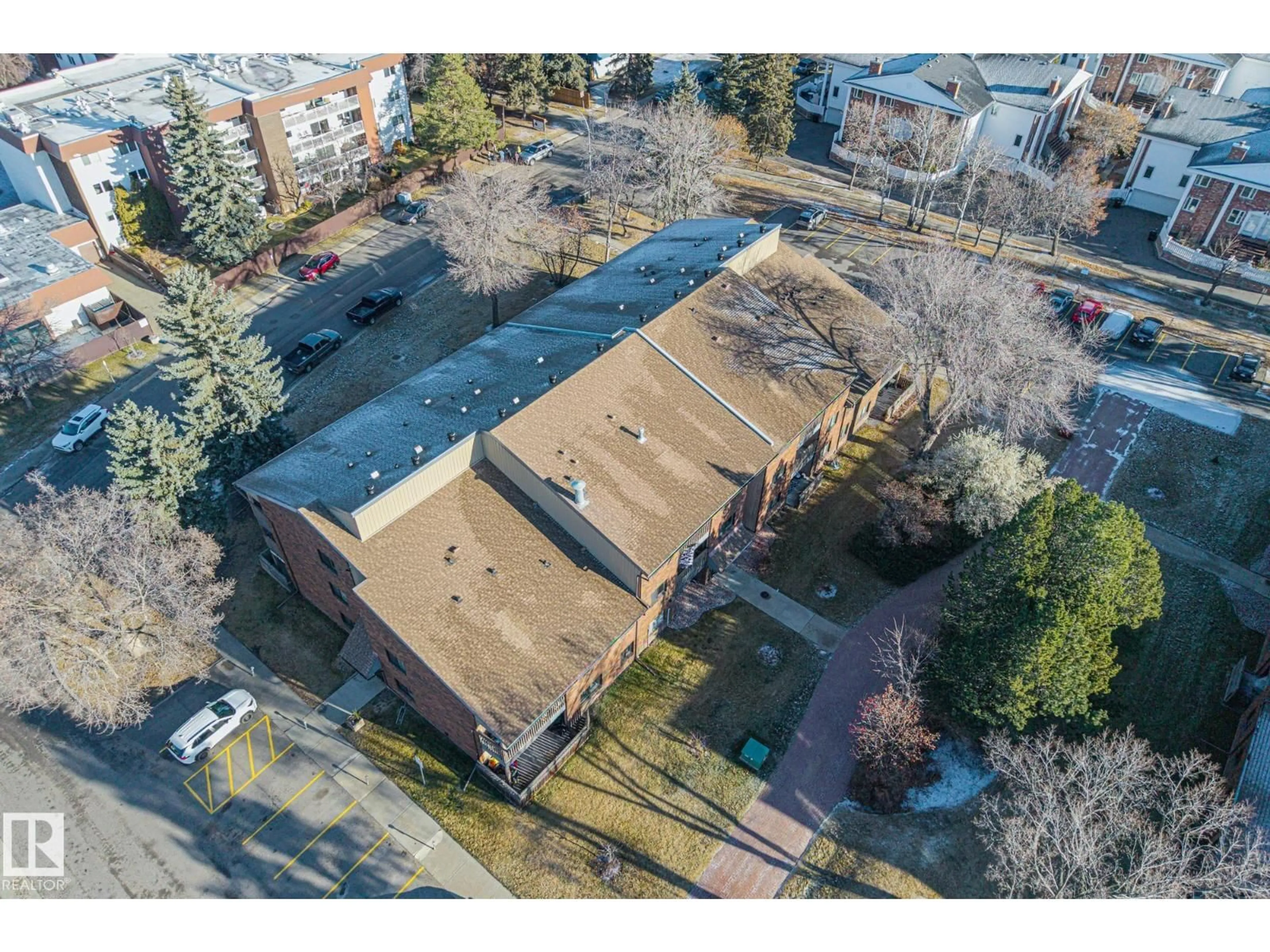 A pic from outside/outdoor area/front of a property/back of a property/a pic from drone, building for #209 - 14811 51 AV, Edmonton Alberta T6H5G4