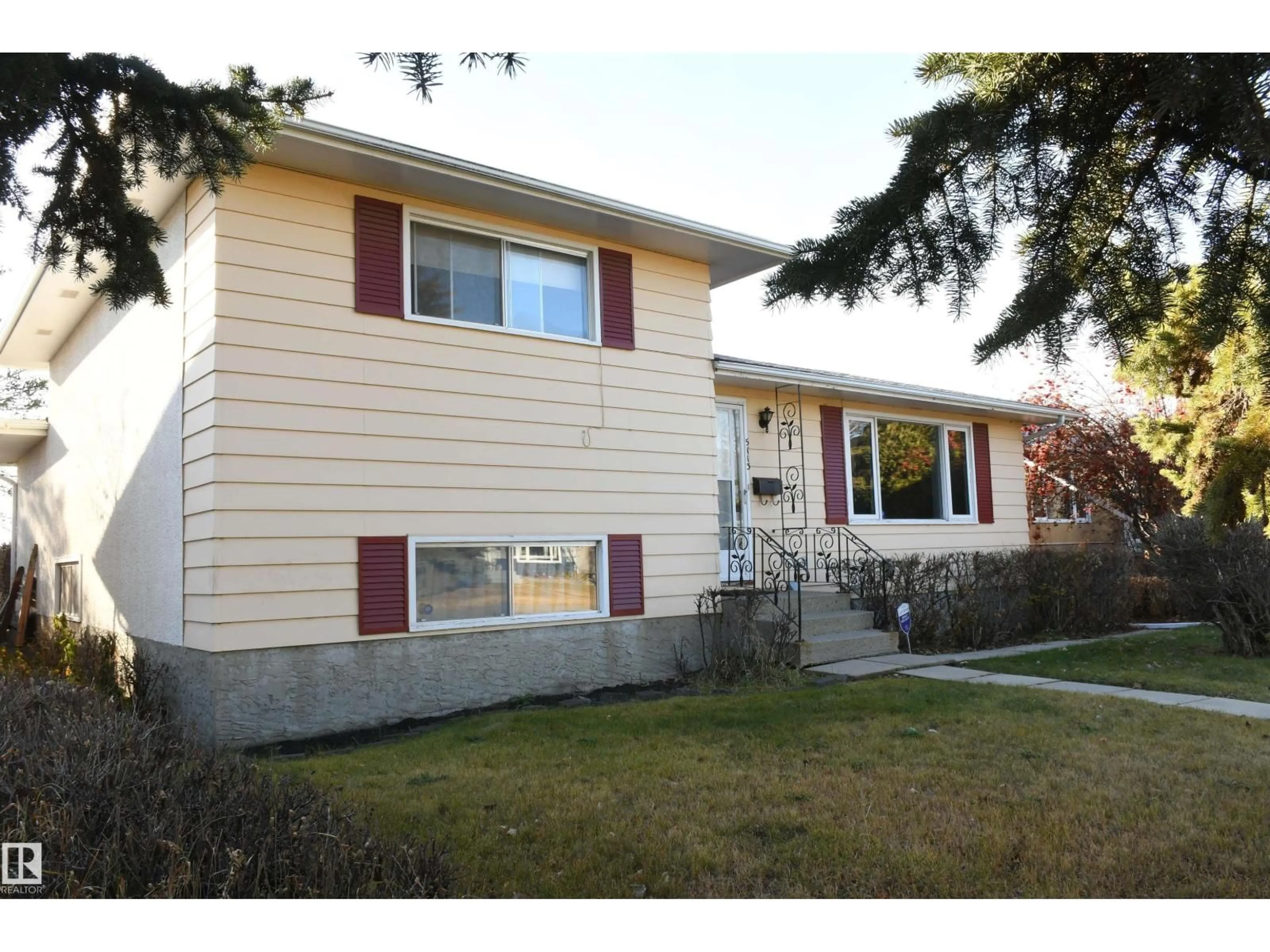 Home with vinyl exterior material, street for 5113 43 AV, Leduc Alberta T9E5A5