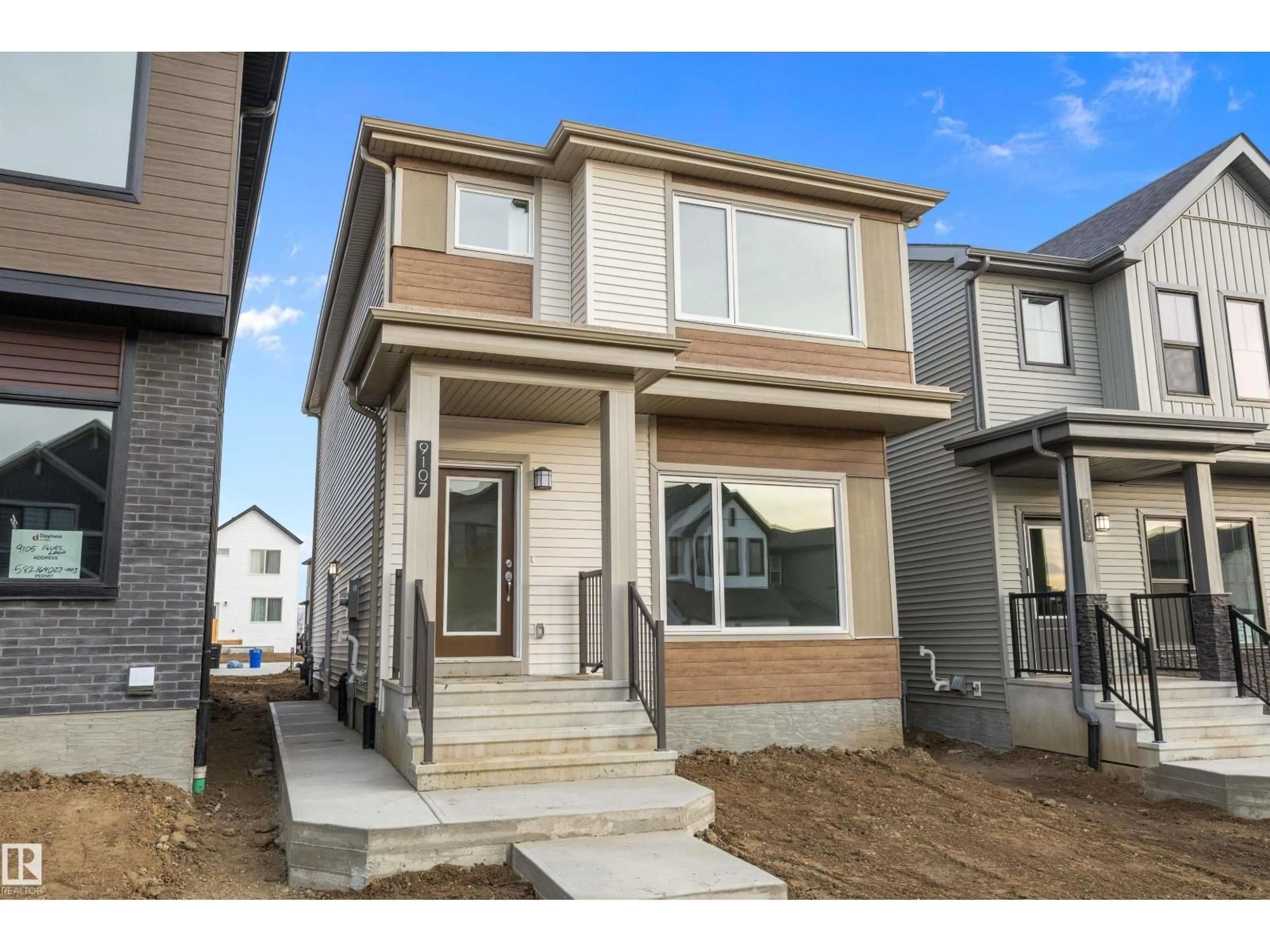 Home with vinyl exterior material, street for 9107 ELVES LOOP NW, Edmonton Alberta T6M3G2