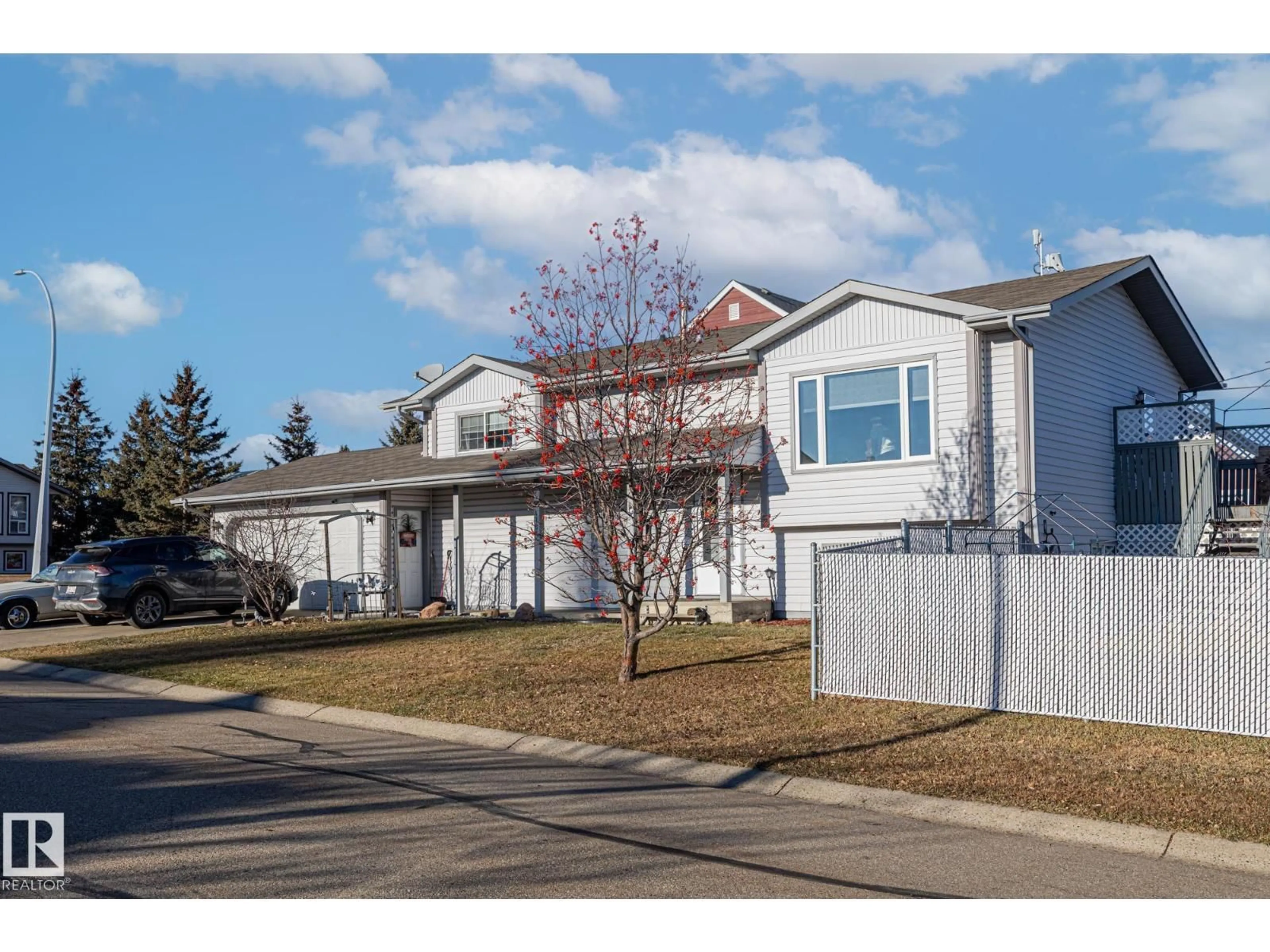 Home with vinyl exterior material, street for 4701 49 ST, Legal Alberta T0G1L0