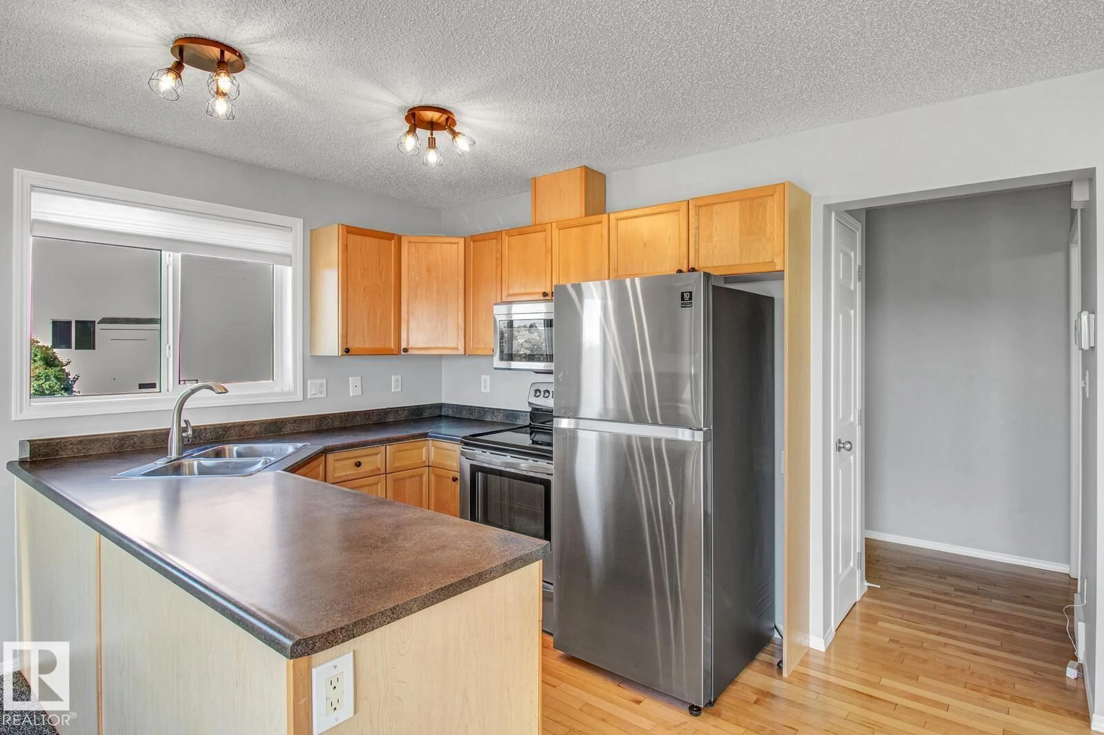 Standard kitchen, wood/laminate floor for 451 - 16 HYNDMAN CRESCENT, Edmonton Alberta T5A5J3