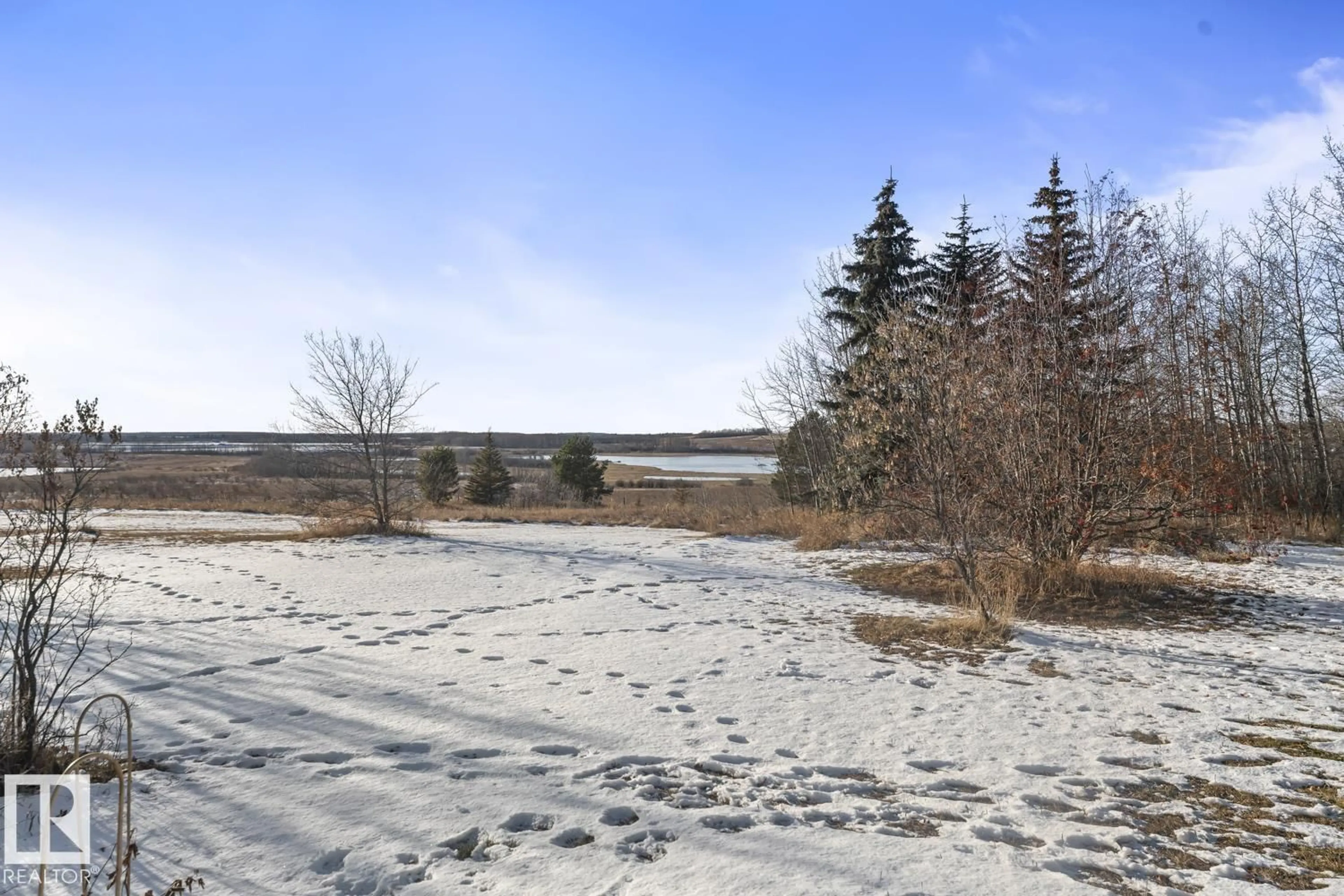 A pic from outside/outdoor area/front of a property/back of a property/a pic from drone, water/lake/river/ocean view for 42003 55 HI, Rural Bonnyville M.D. Alberta T9M1P4
