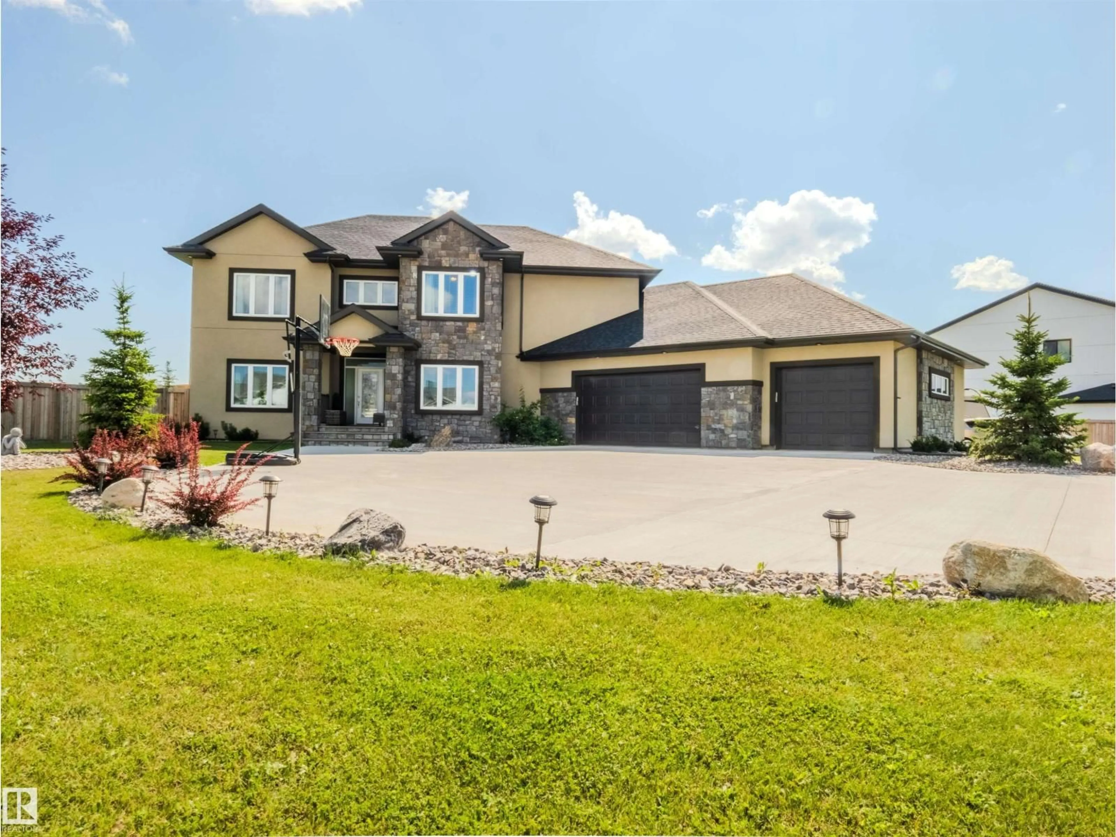 Home with vinyl exterior material, street for 69 26409 TWP ROAD 532 A, Rural Parkland County Alberta T7X0W7